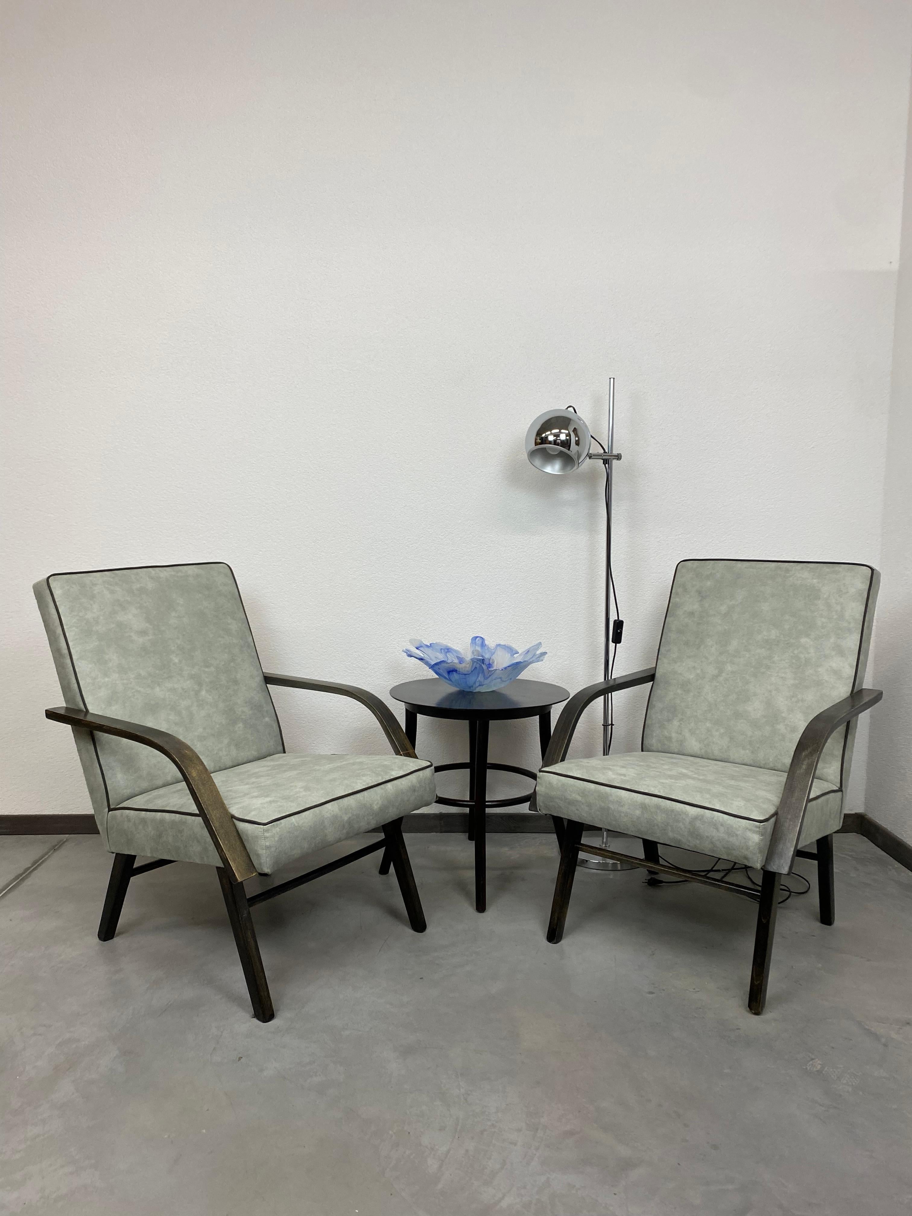 Vintage armchairs after professional renovation.