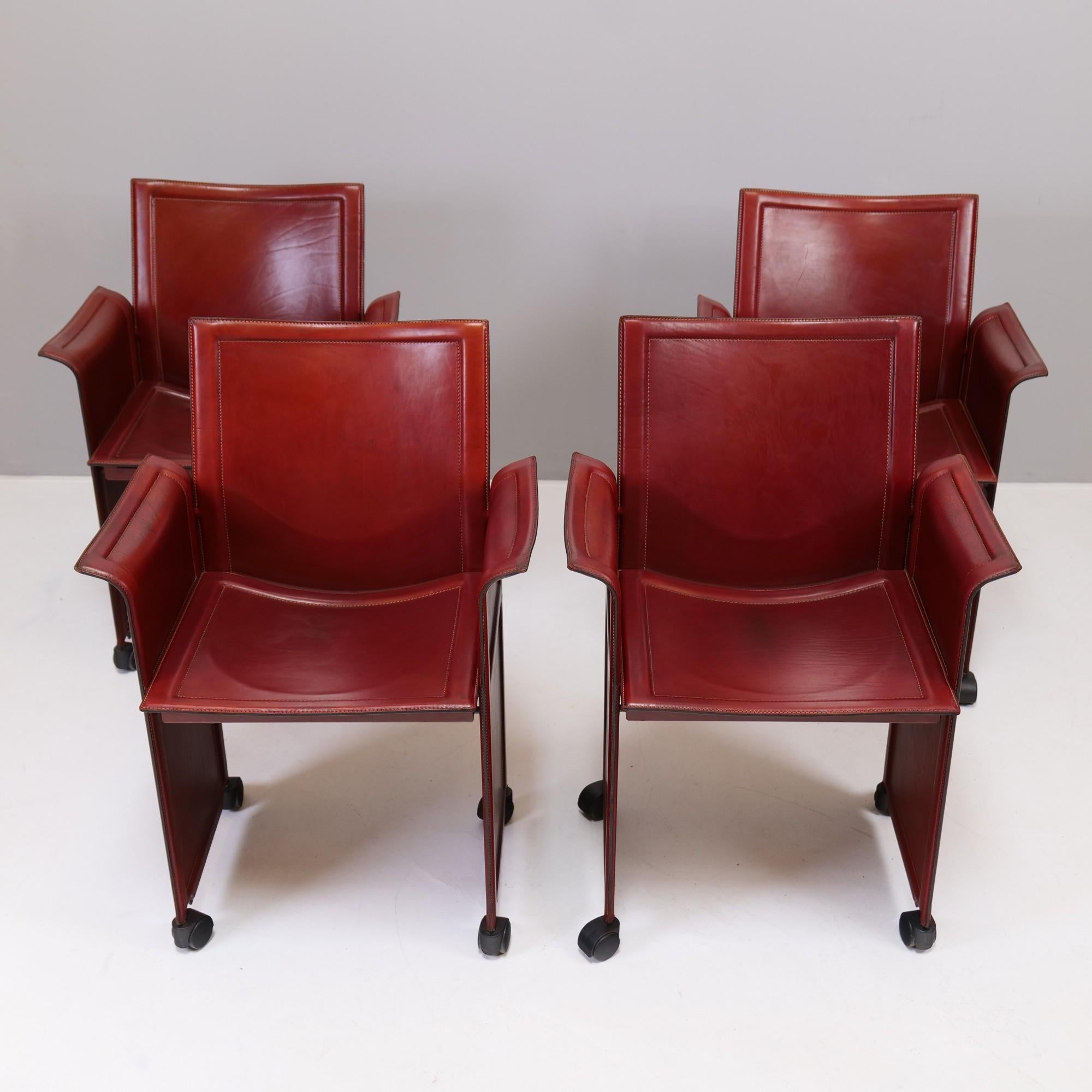 vintage Matteo Grassi set of 4 leather armchairs.