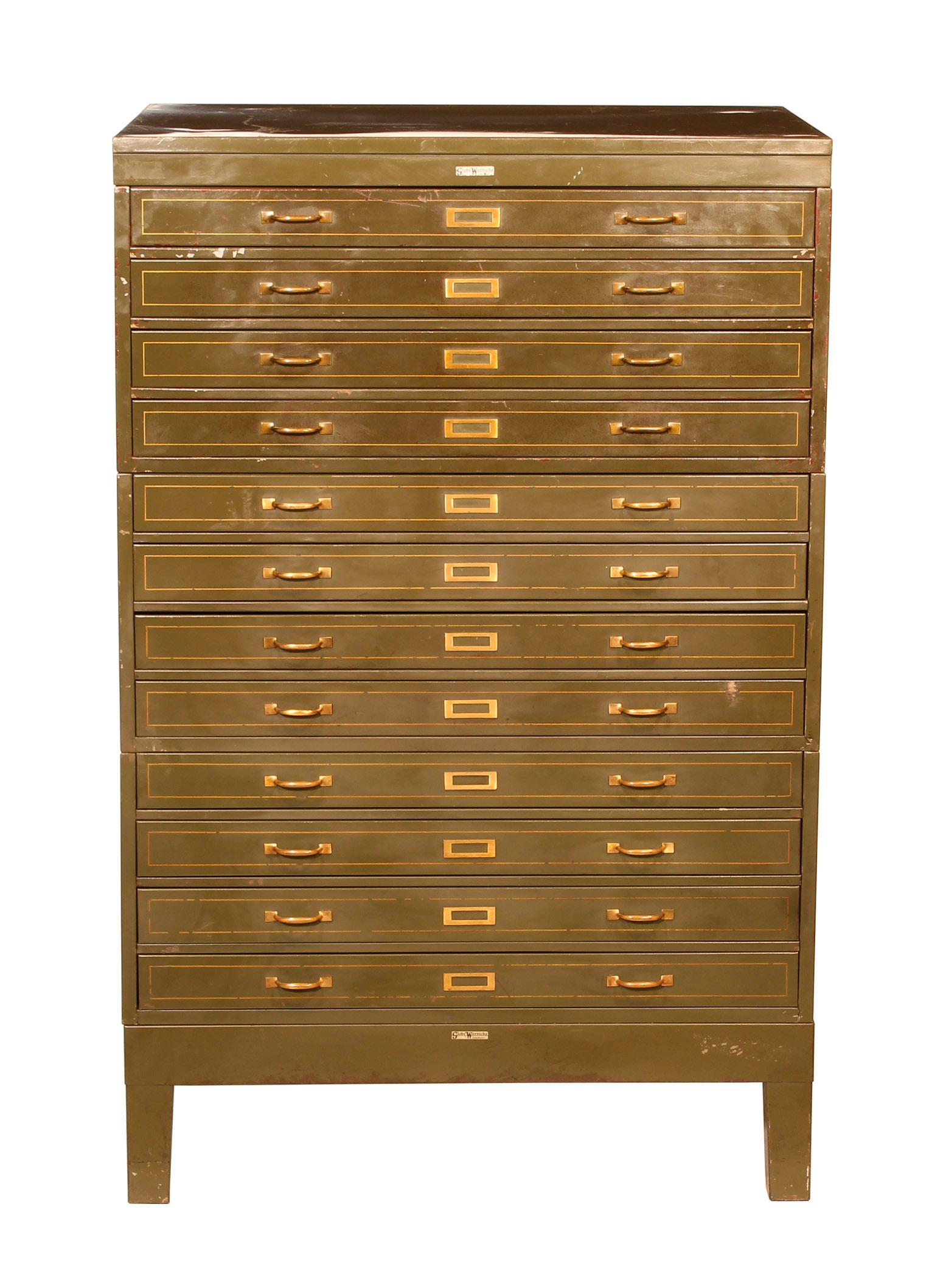 Vintage steel flat file blueprint / architect cabinet by Globe Wernicke. Features twelve drawers, brass handles and name plates. Beautifully worn army green paint with gold pin-striping. Can even see the coat of red primer underneath. Flat-file is