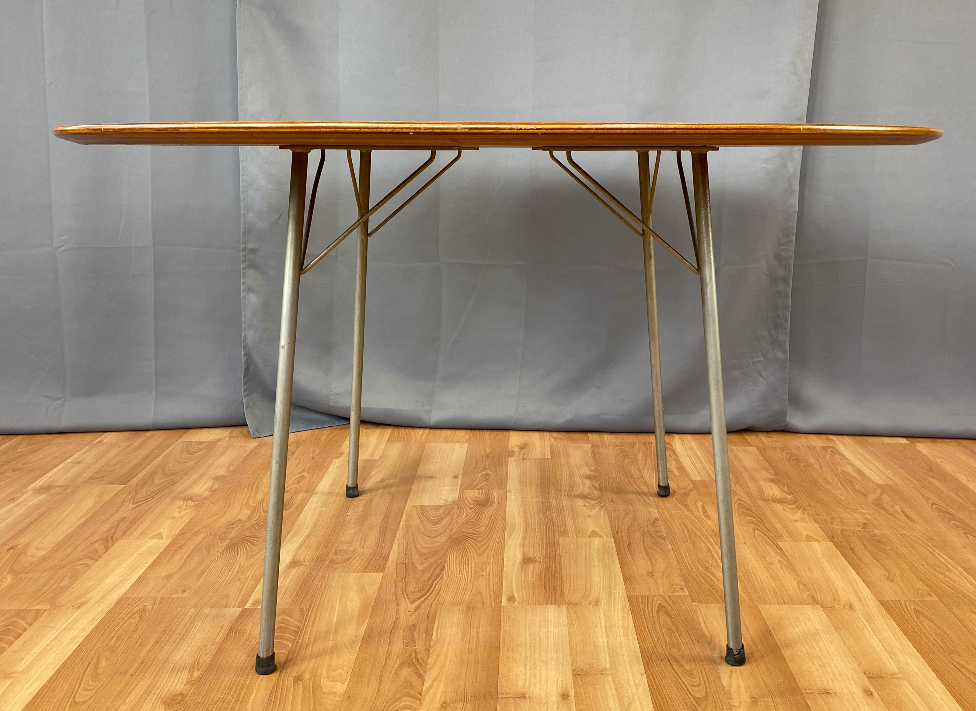 Offer here is a Arne Jacobsen for Fritz Hansen model 3600 teak dining table, first design in 1952.
