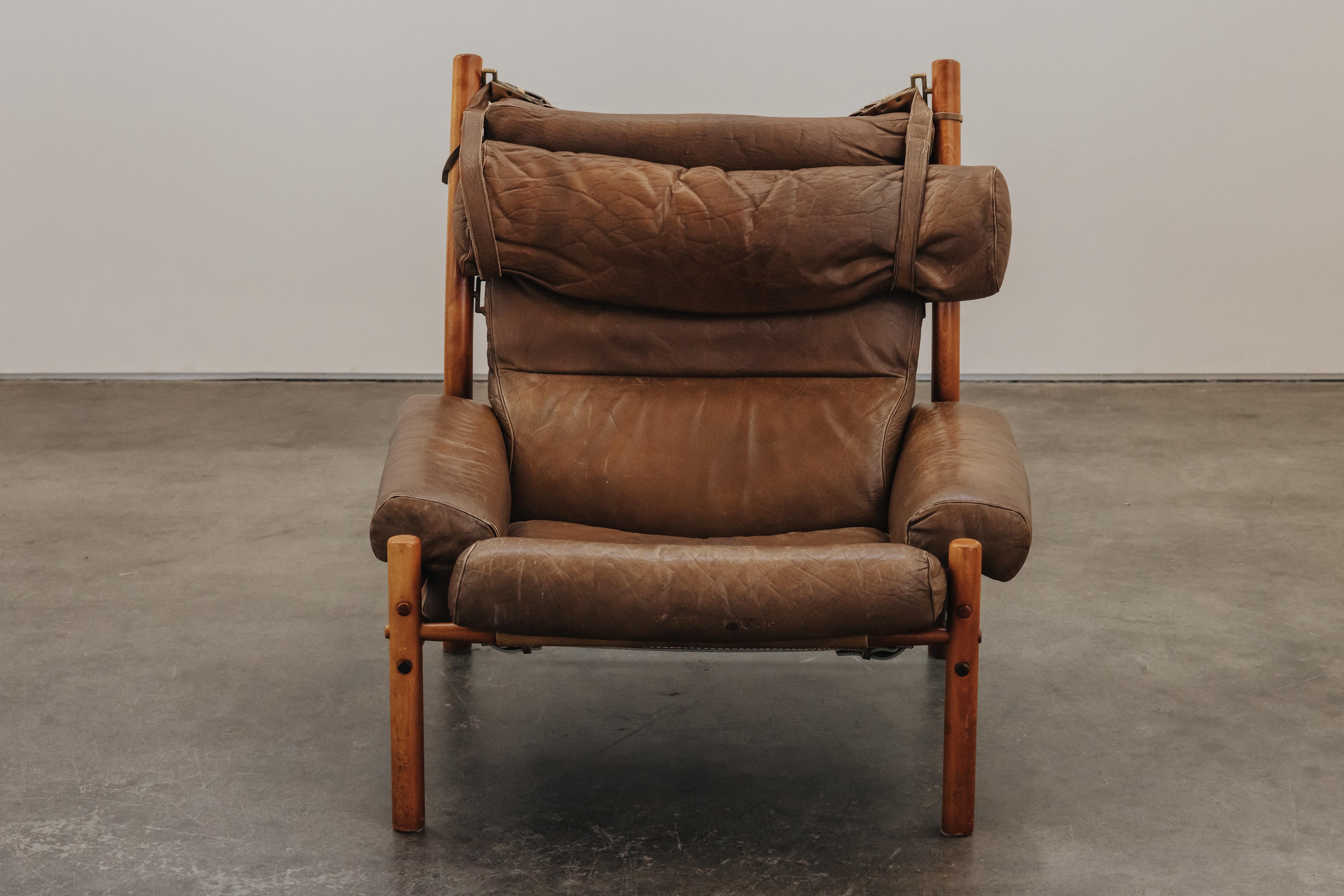 Vintage Arne Norell Inca Lounge Chair aus Schweden, CIRCA 1970.  Gestell aus massiver Buche mit original braunen Lederkissen.  Gewisse Abnutzung und Gebrauchsspuren.