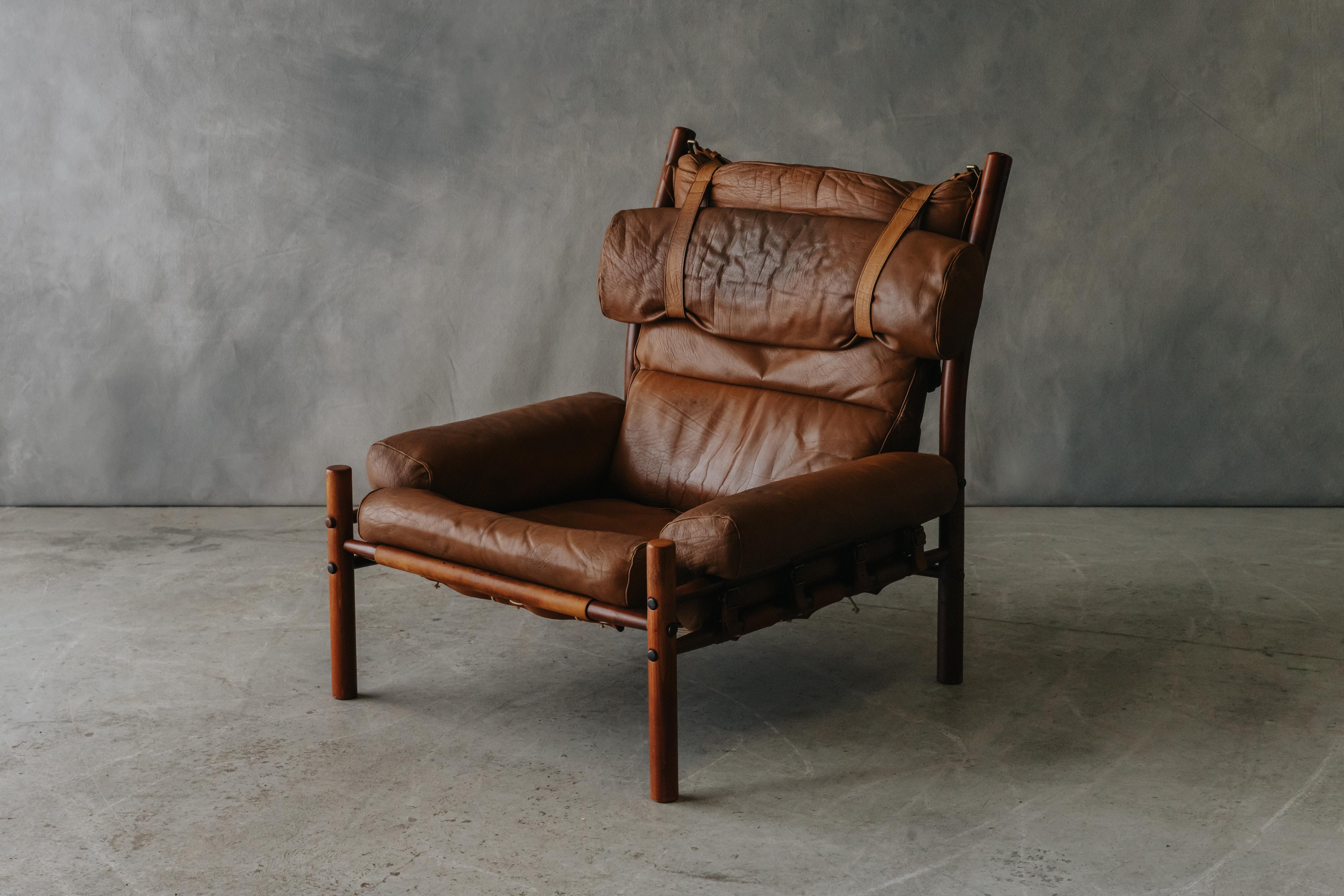 Vintage Arne Norell Lounge Chair, Model Inca, From Sweden, Circa 1970.  Solid beech frame with original brown leather upholstery.  Great wear and patina.