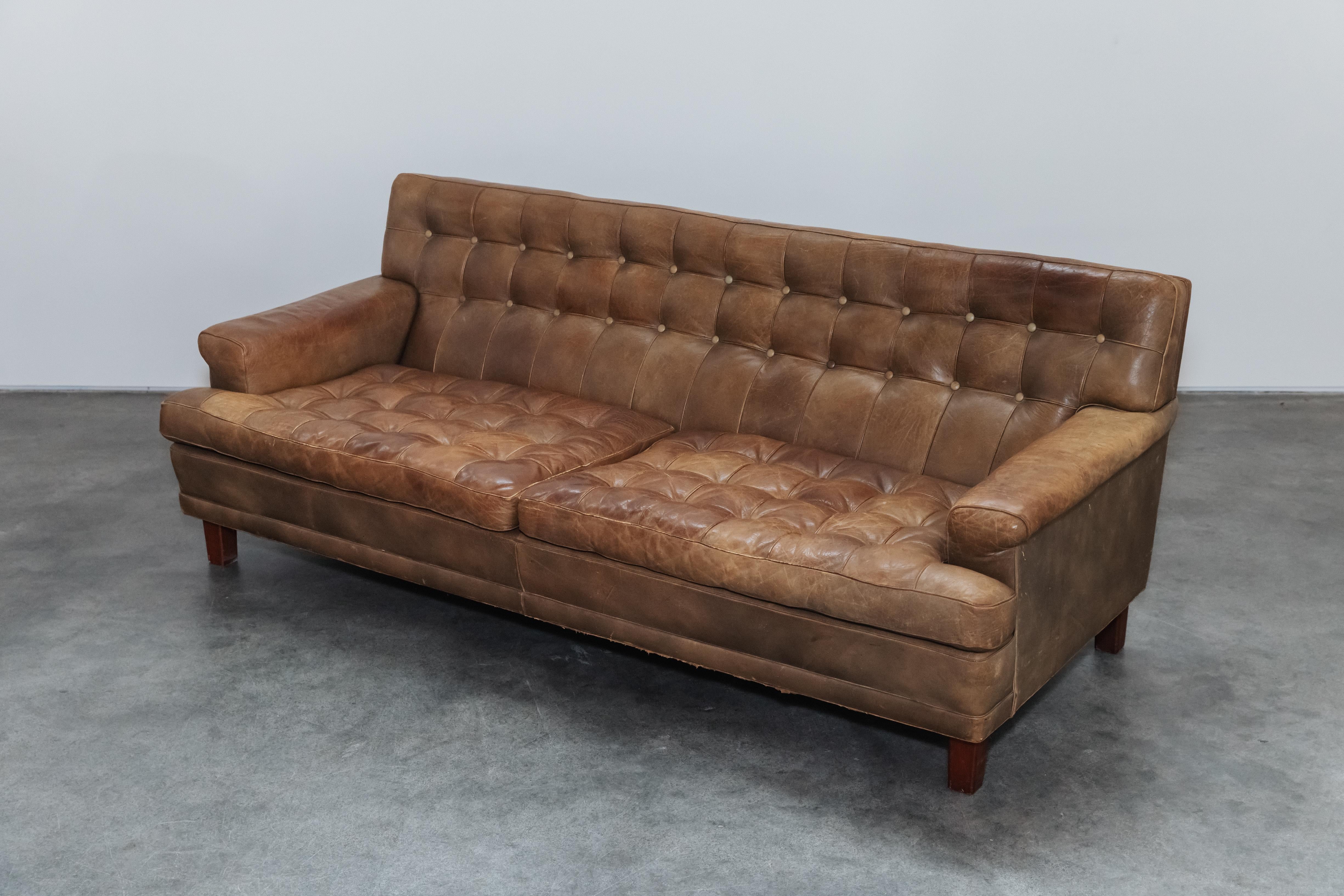 Vintage Arne Norell Merkur Sofa From Sweden, Circa 1970.  Original tan leather upholstery with nice patina and use.


