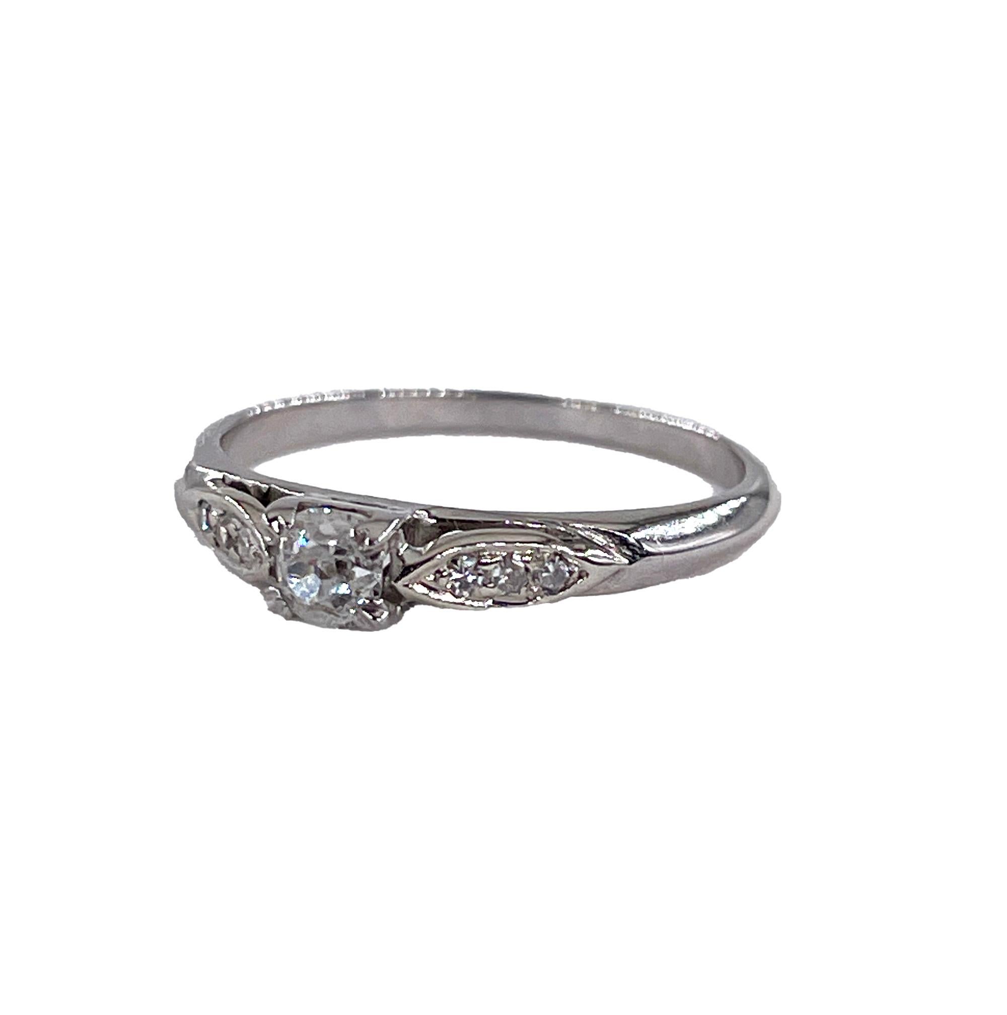 This is a VERY sweet and and utterly charming, this petite ART DECO CIRCA 1939s DIAMOND Engagement or Promise ring with estimated 0.17ctT OLD MINE CUSHION Center diamond in G-H color, SI clarity (White and eye Clear), Unusually high quality for that
