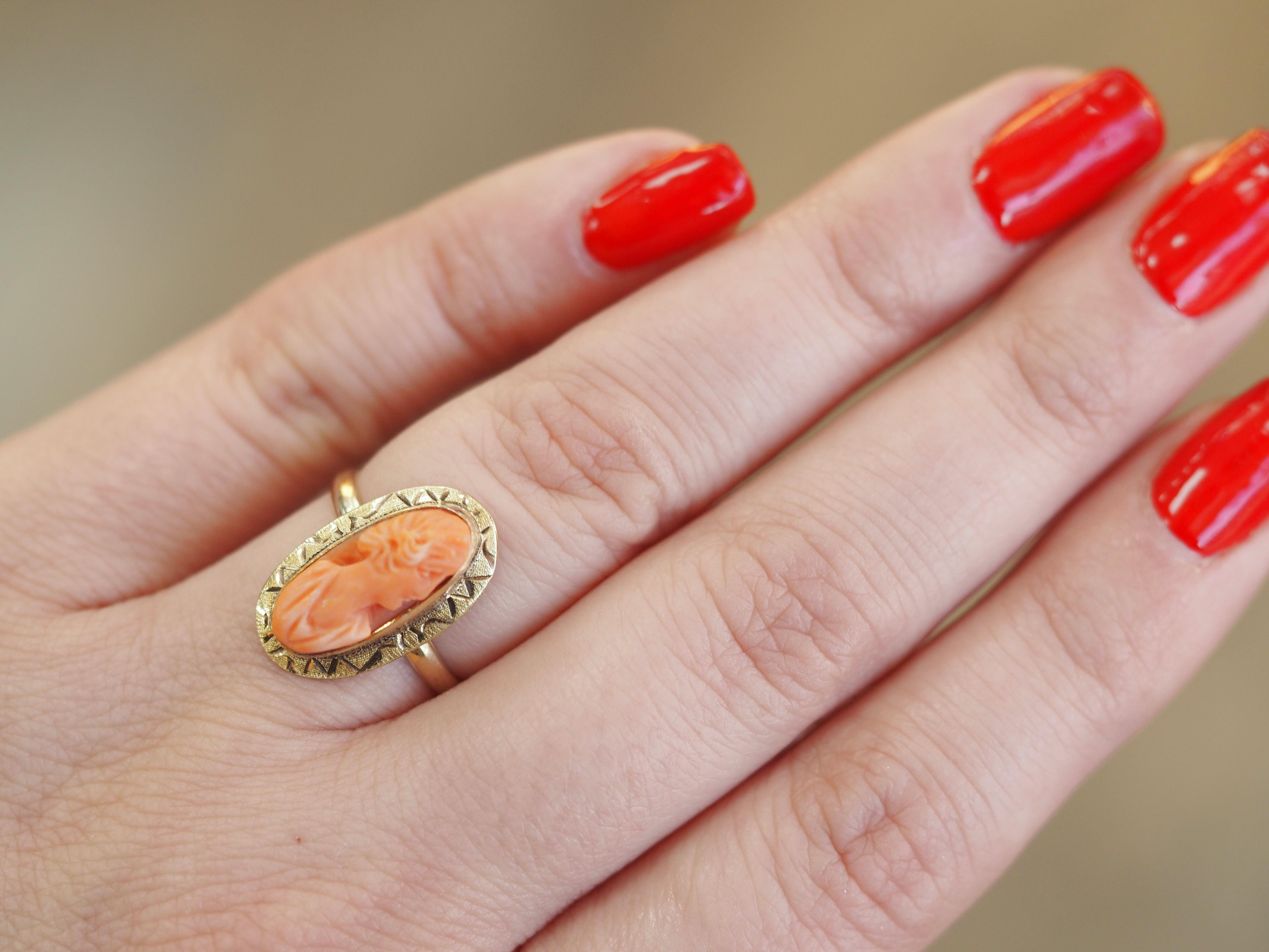 This intricately carved shell cameo ring is as stunning as it is unique in 10 karat yellow gold! These yellow gold vintage rings are tougher to find and this one is in great condition! These also look super cute stacked with other vintage bands!
Can