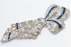 Vintage Art Deco 14K White Gold Diamond and Sapphire Bow Brooch