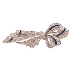 Vintage Art Deco 14K White Gold Diamond and Sapphire Bow Brooch
