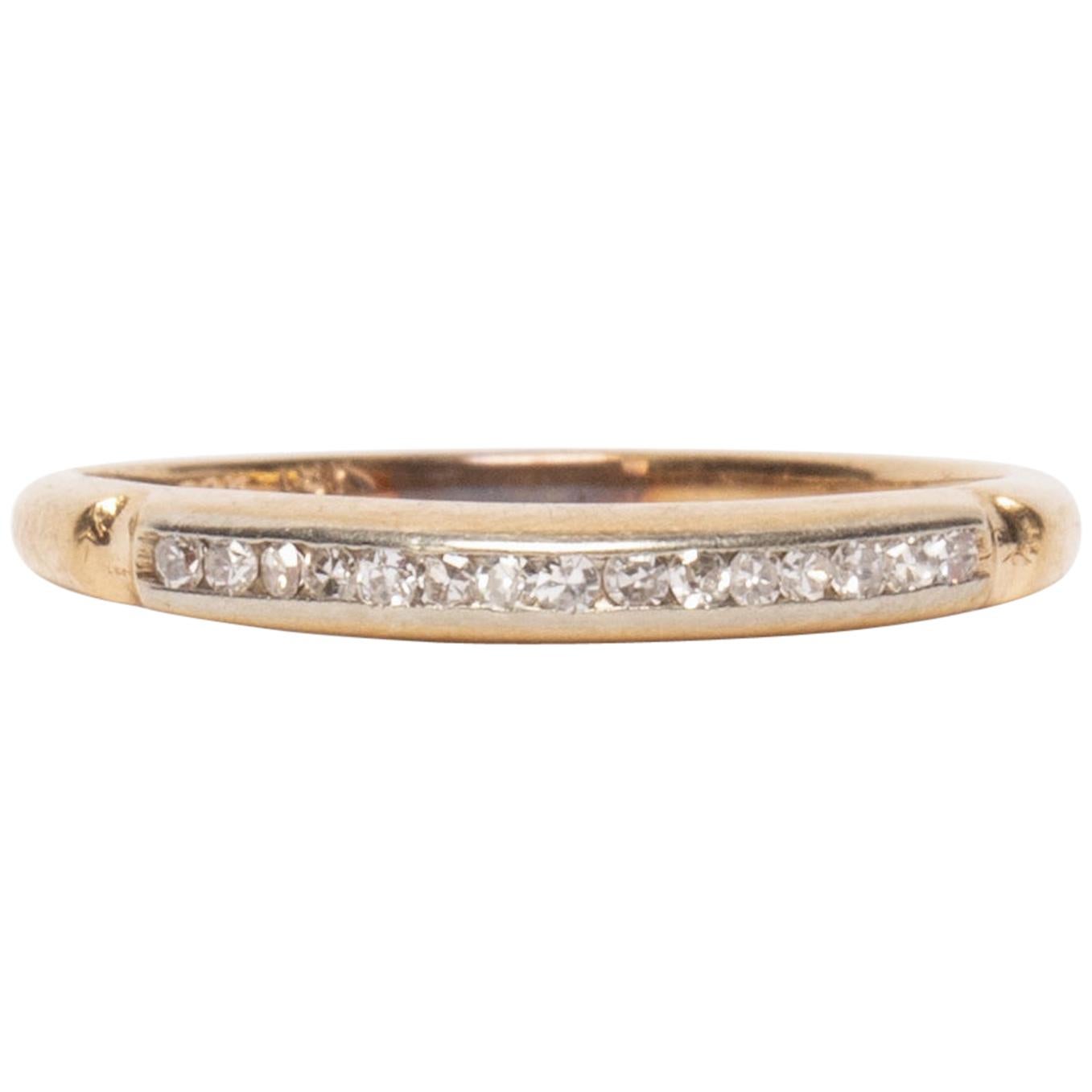 Vintage Art Deco 15 Diamond Channel 14 Karat Two-Tone Wedding Band, circa 1940s