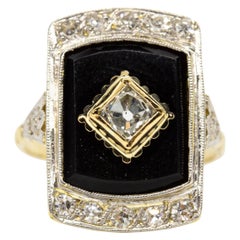 Vintage Art Deco 18 Karat gold Diamond and Onyx Ring