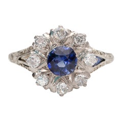 Antique Art Deco 18 Karat White Gold Blue Sapphire and Old Cut Diamond Halo Ring