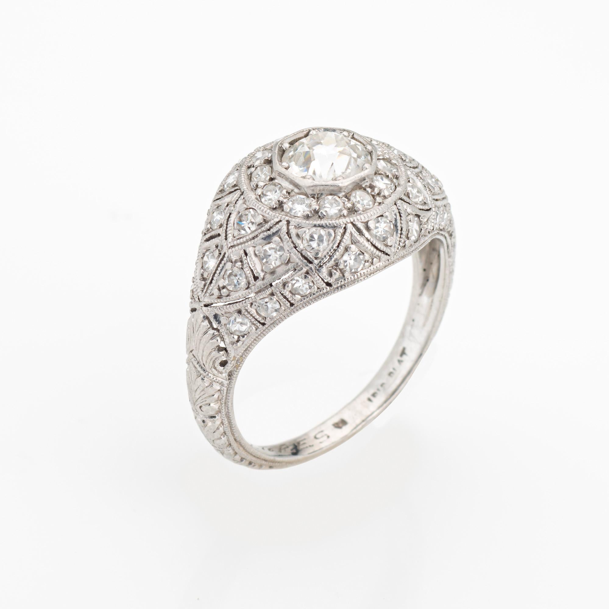 Finely detailed vintage Art Deco diamond ring (circa 1920s to 1930s) crafted in 900 platinum. 

Center set old European cut diamond is estimated at 0.60 carats, accented with an estimated 0.40 carats of single cut diamonds. The total diamond weight