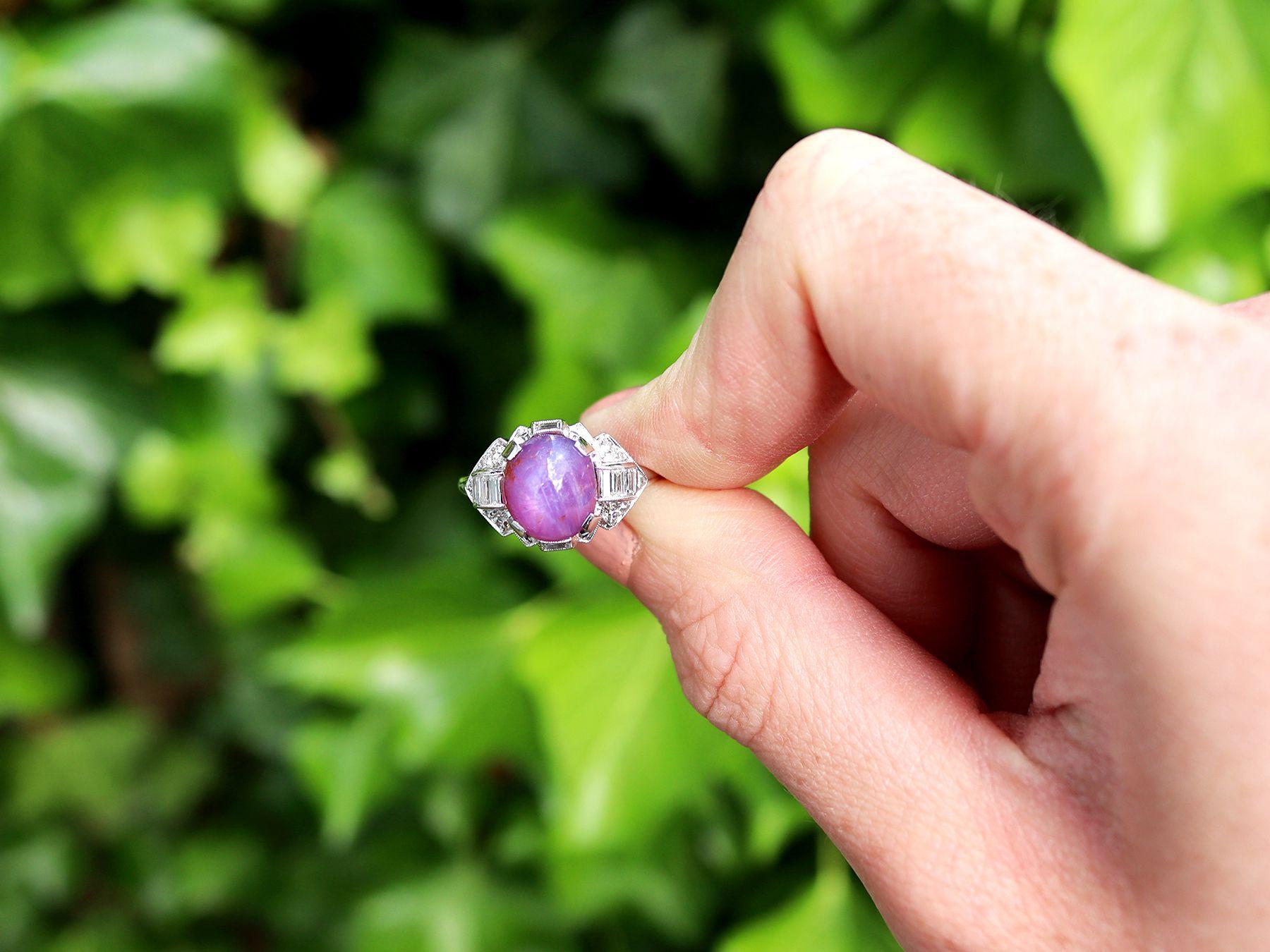 A stunning, fine and impressive vintage Portuguese 4.85 carat star ruby and 0.30 carat diamond platinum dress ring; part of our diverse vintage jewellery and estate jewelry collections.

This stunning, fine and impressive vintage ruby cluster ring