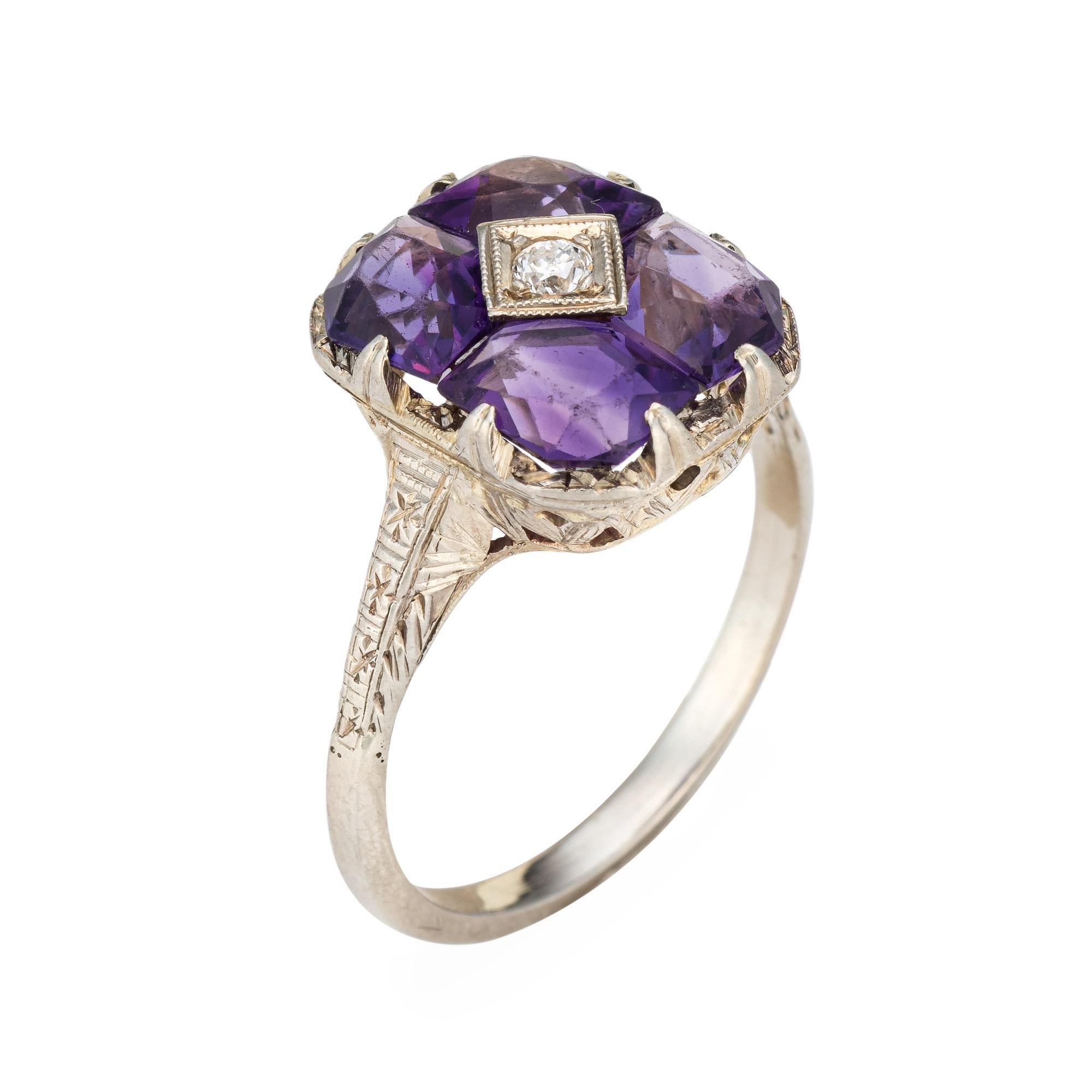 Finely detailed vintage Art Deco amethyst & diamond ring (circa 1920s to 1930s) crafted in 14k white gold. 

Old european cut diamonds is estimated 0.05 carats (estimated at I-J color and SI2 clarity). The amethysts measure 5mm each (note: light