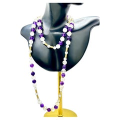 Amethyst and Hand Carved Rock Crystal Long Necklace, Circa 1970s