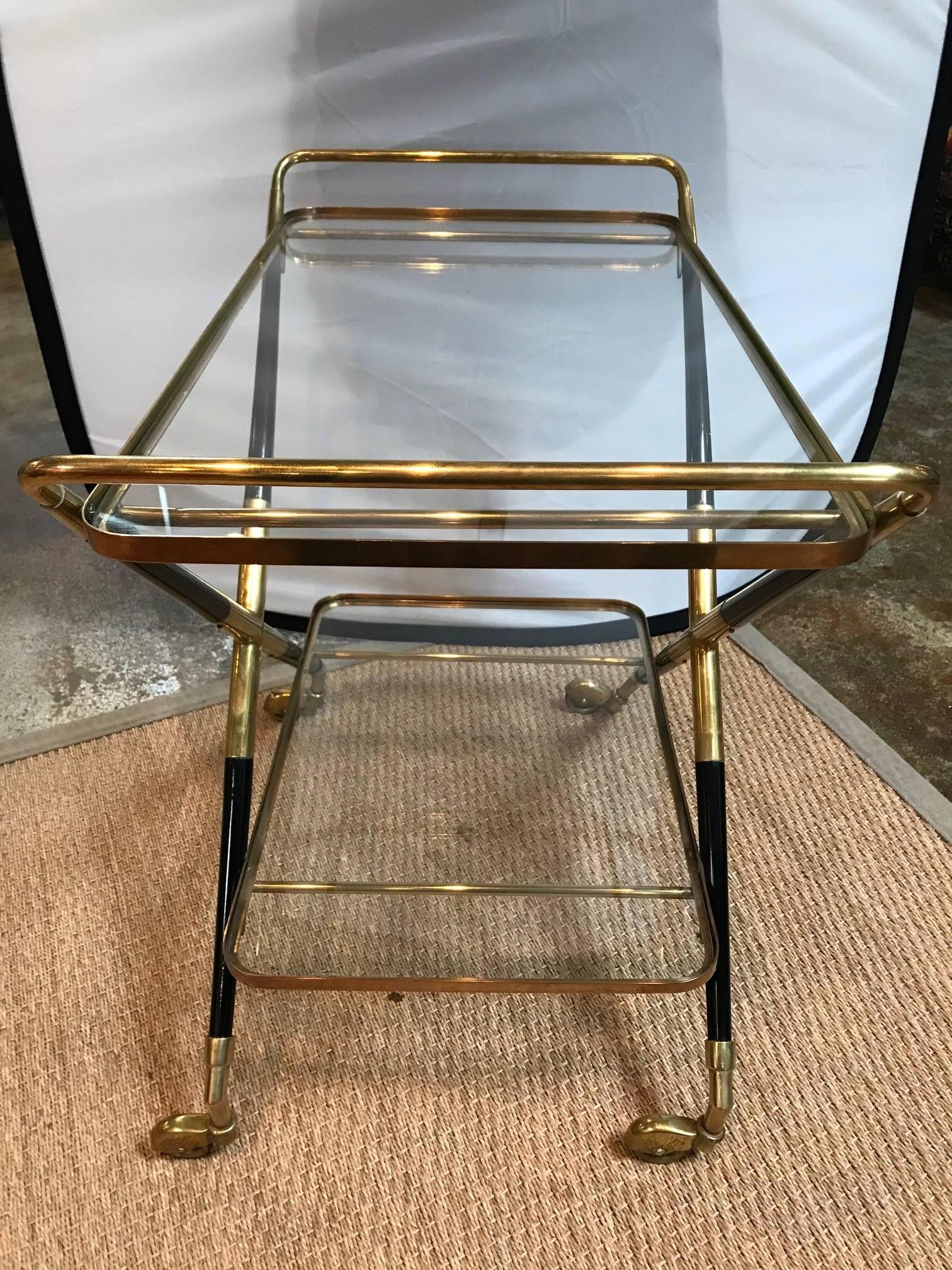 Art Deco rolling bar cart
Gold and black.