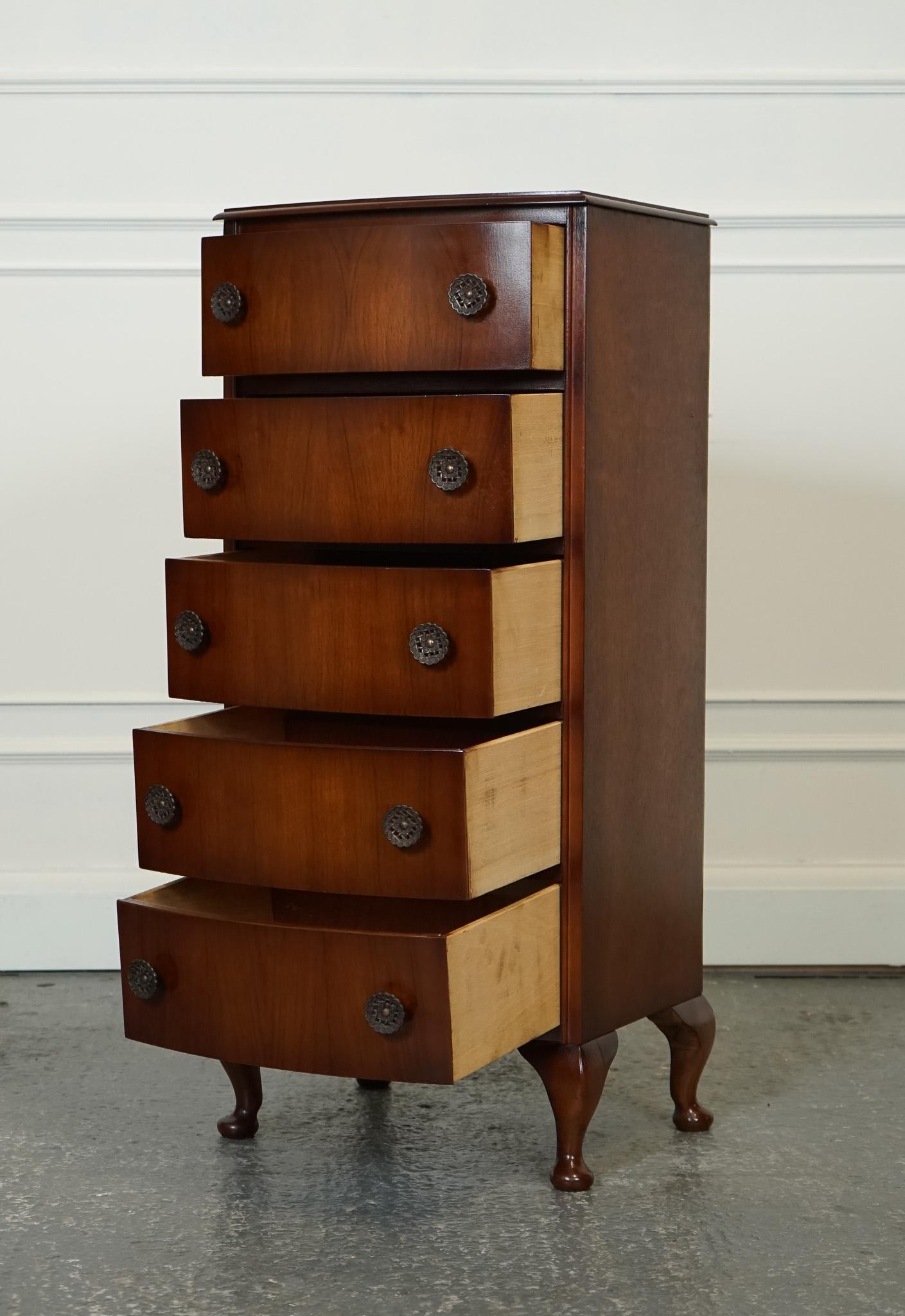 
We are delighted to offer for sale this Vintage Art Deco Tallboy.

The Vintage Art Deco Bow Fronted Mahogany Tall Boy Chest of Drawers features a stunning mahogany wood construction with a bow-front design.

 It is elegantly supported by Queen Ann