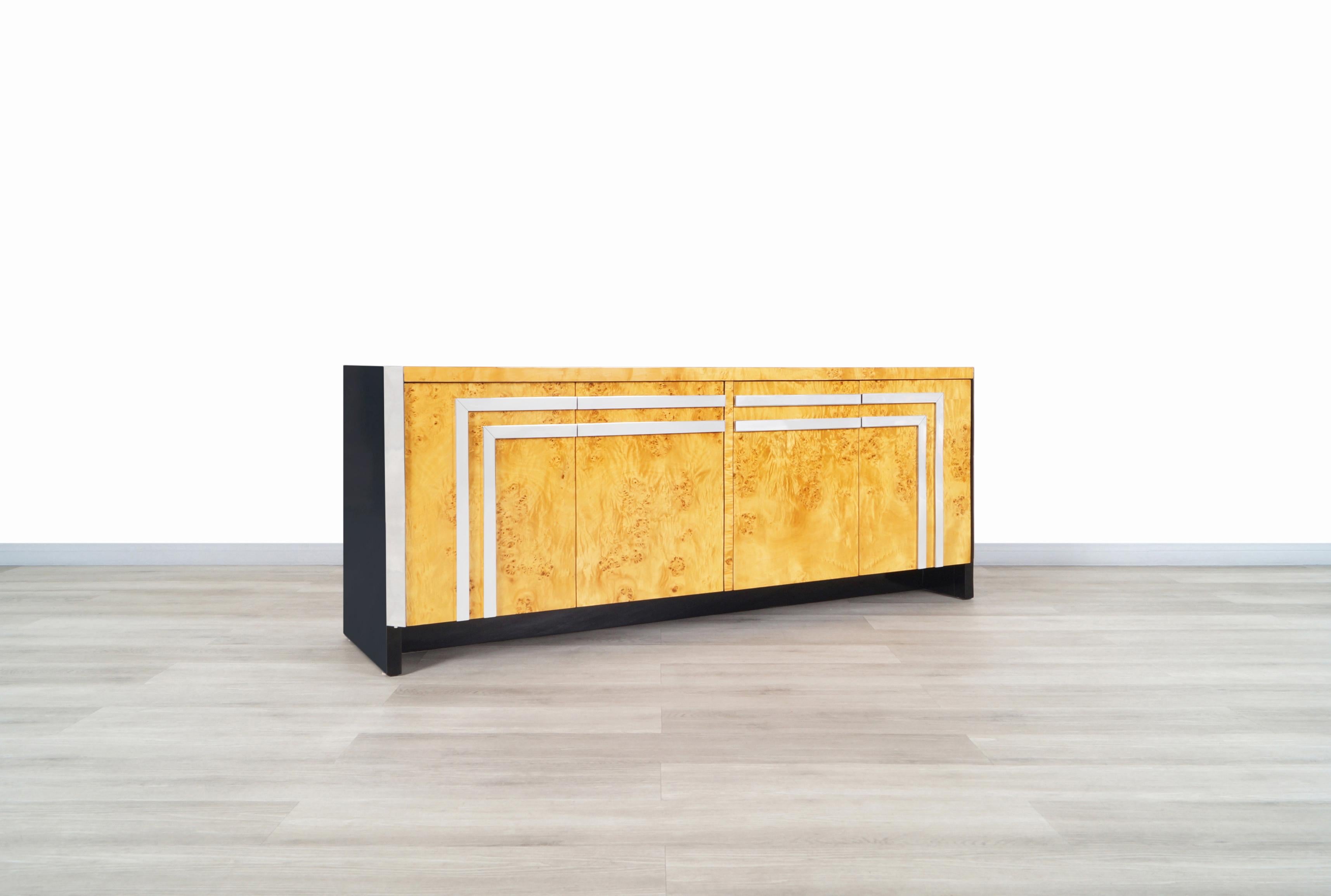 Exceptional vintage Art Deco style burl wood credenza designed by Leon Rosen for Pace Collection in Italy, circa 1970s. This credenza has a minimalist design that is complemented by its elegant high-quality materials that makes it a glamorous piece