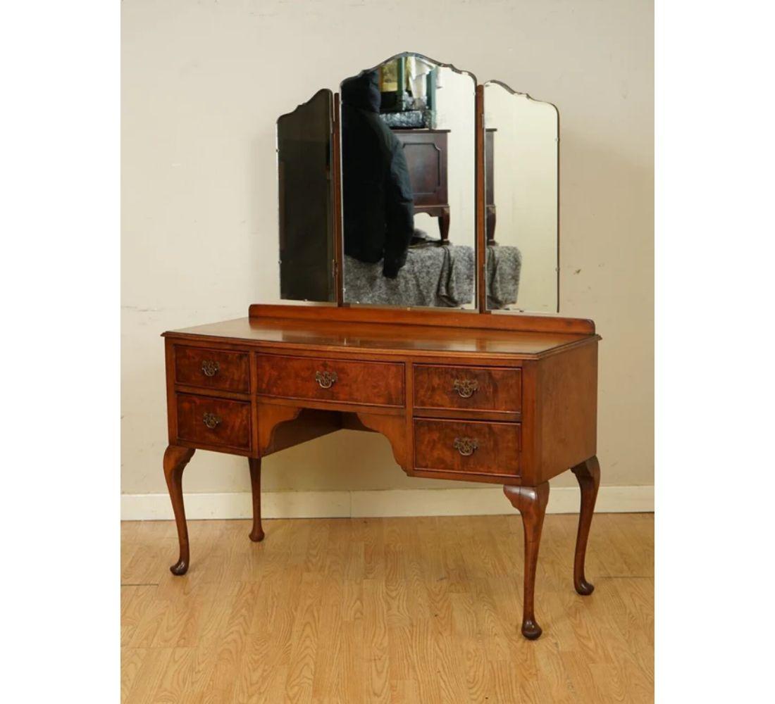 We are delighted to offer for sale this Beautiful Queen Anne Burr Walnut Dressing Table With Trifold Mirrors.

This dressing table has been beautifully made, well made and solid. We have lightly restored this by cleaning it all over, hand waxing
