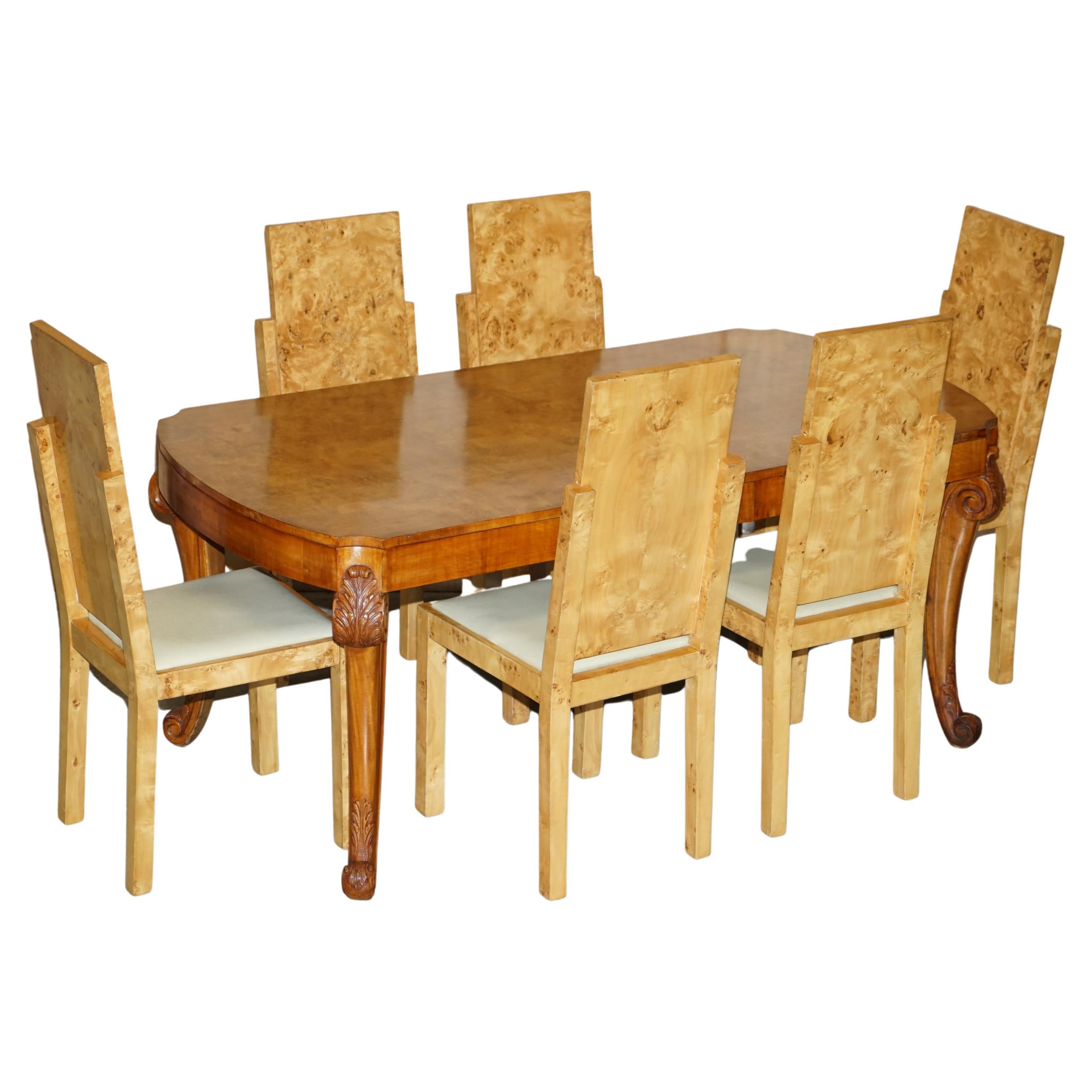 Vintage Art Deco Burr Walnut Ornately Carved Dining Table and 6 Dining Chairs For Sale