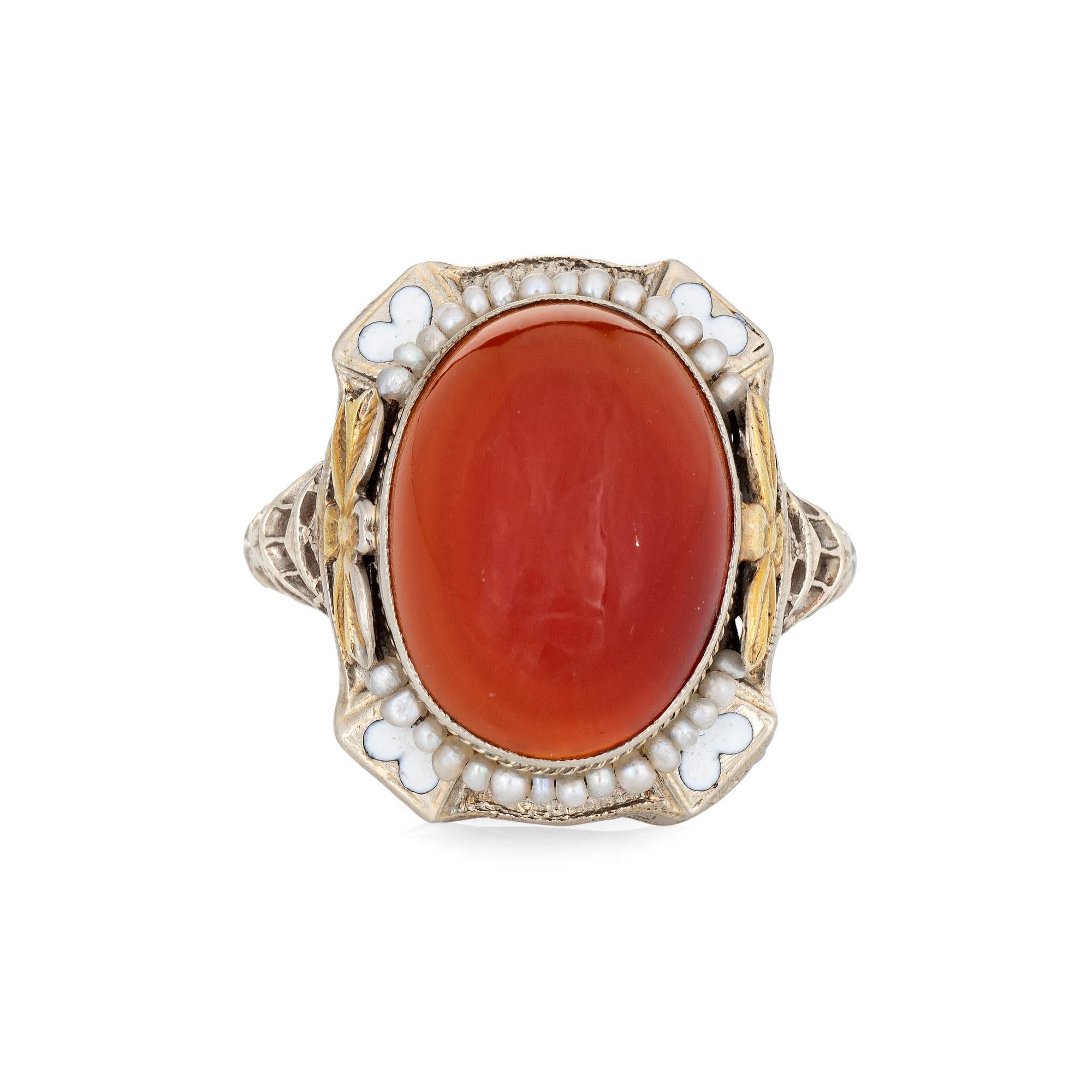 Elegant & finely detailed Art Deco carnelian ring (circa 1920s to 1930s) crafted in 14k white gold. 

Carnelian measures 16mm x 12mm. The carnelian is in very good condition and free of cracks or chips.     

The ring epitomizes vintage charm with a
