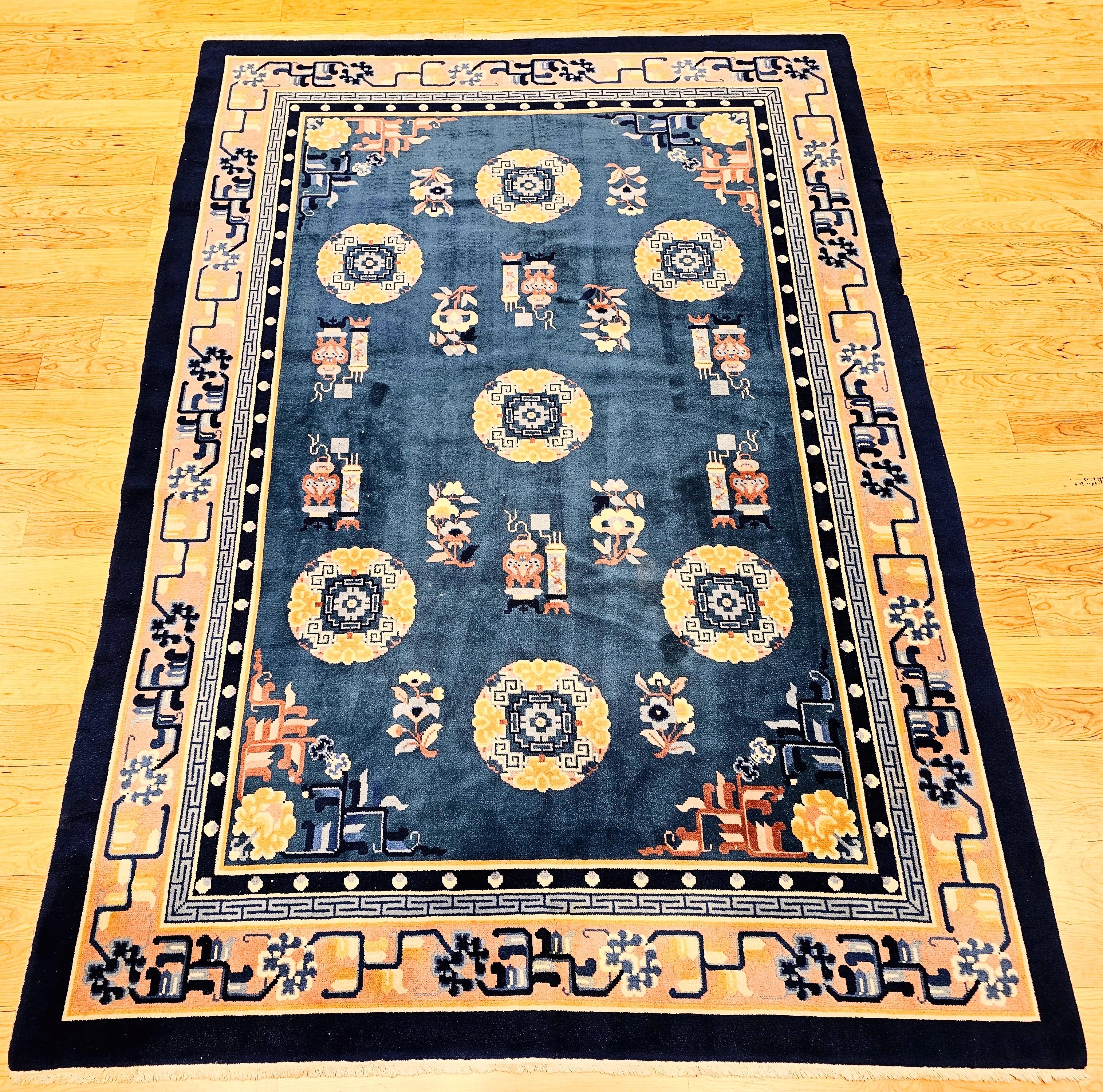 Beautiful Art Deco style Chinese rug from the mid 1900s with a French blue background and a pale pink and blue color  border.  The design of this rug resembles the 18th 19th century Ningxia carpets with similar lattice and lotus design.  Also, the