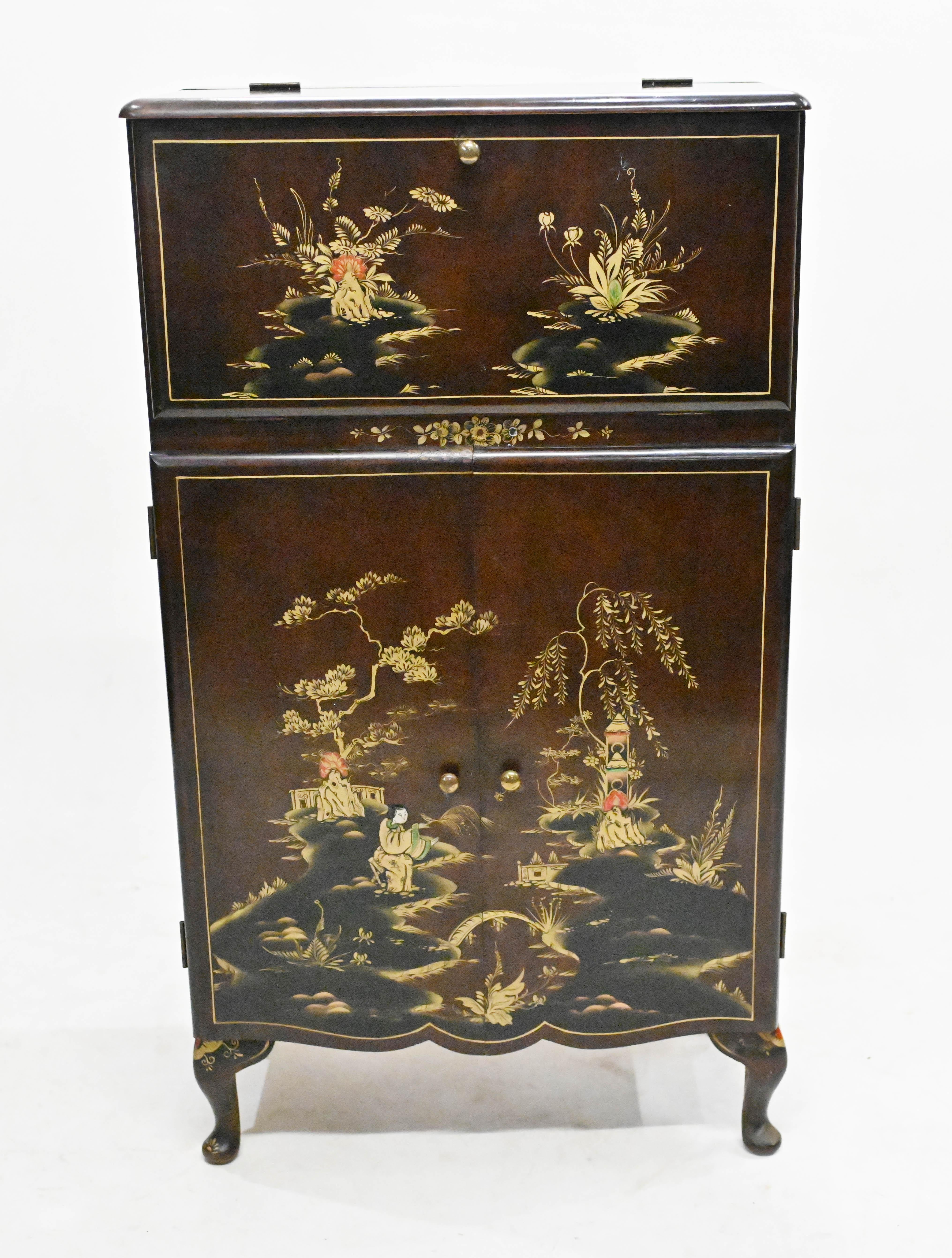 Collectable vintage art deco cocktail cabinet with lacquered finish
Features intricate Chinoiserie work showing Chinese figures, pagodas and foliage
Great interiors look very Shanghai surprise
Circa 1930
Opens out to reveal drinks serving area with