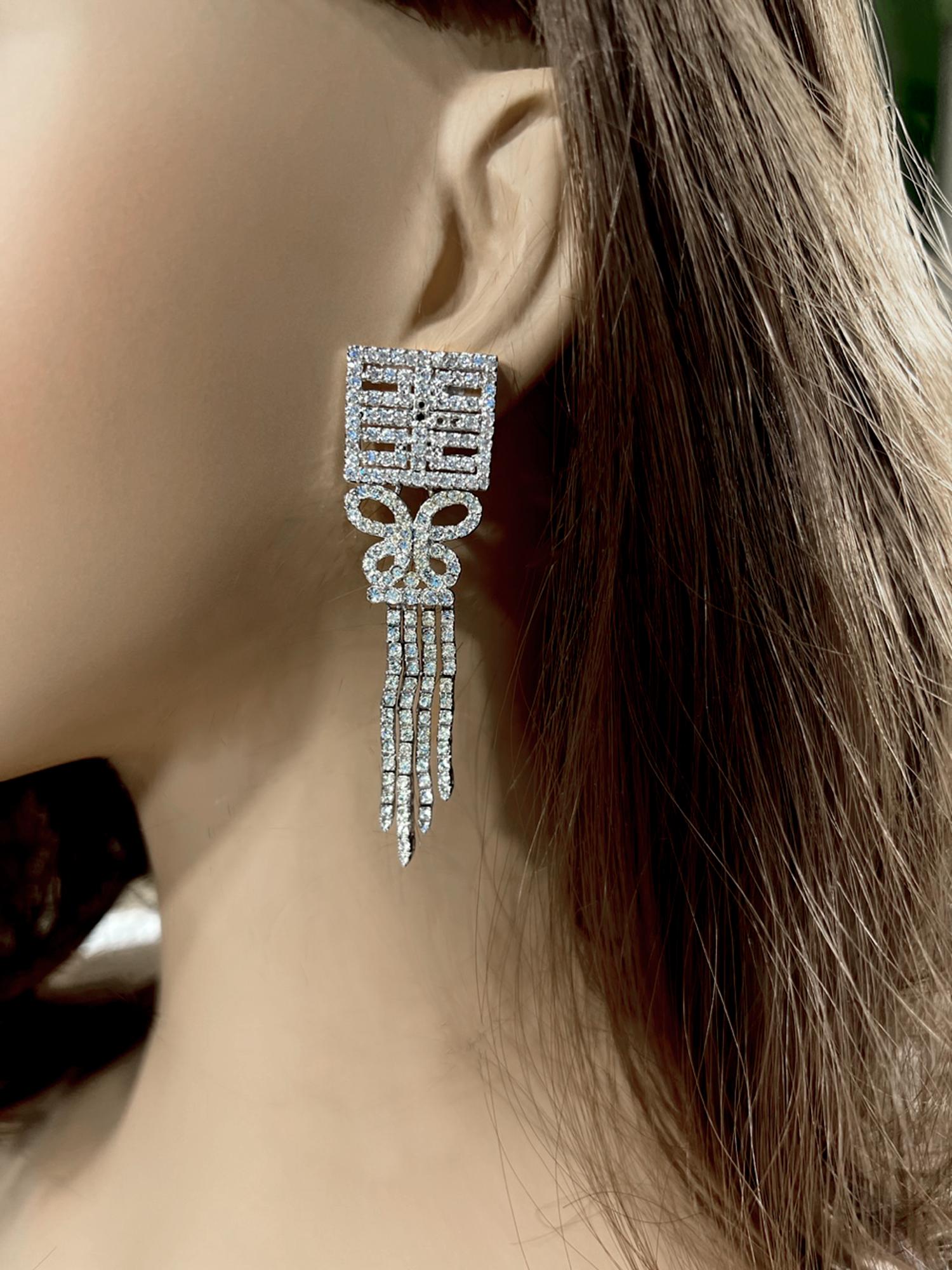 Our exclusive jewellery is unique; this is the only jewel of such design, quality and elegance found on 1stibs.
Vintage Art Deco Costume Jewelry Cubic Zirconia Sterling Long Dangly Tassel  Earrings Chinese Good Luck Motif Top Pierced earrings 2.5