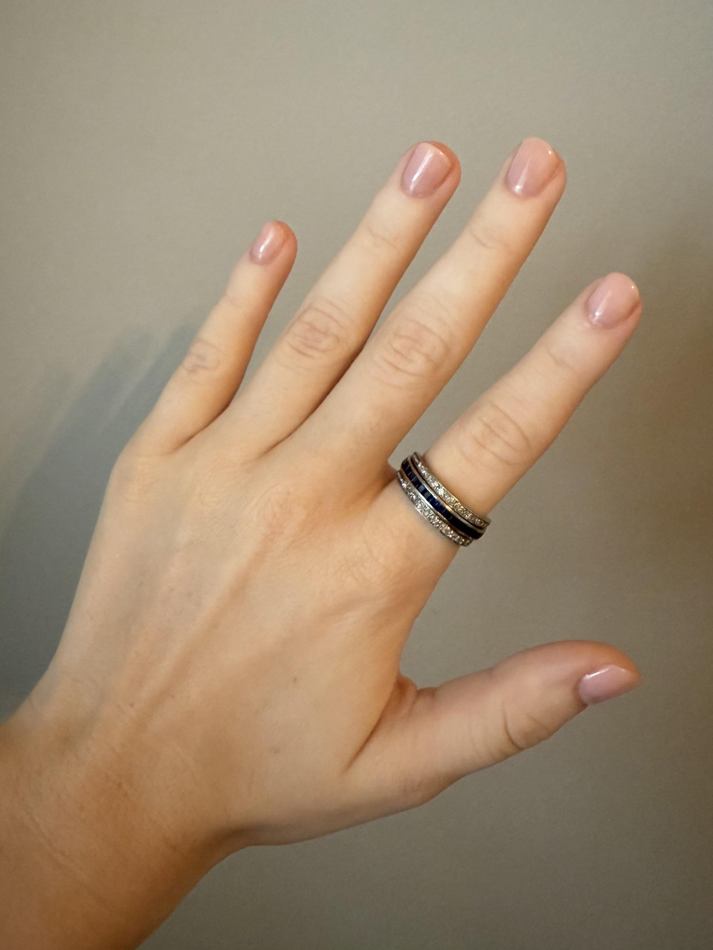 We are loving this unique vintage band style ring!!
She can be worn multiple ways depending on how you arrange the hinged diamond bands!!

Ring Details
Material: Platinum
Era: Art Deco 1920 - 1940
Weight: 6.4mm
Finger Size: 6 1/4
Sizable up to a