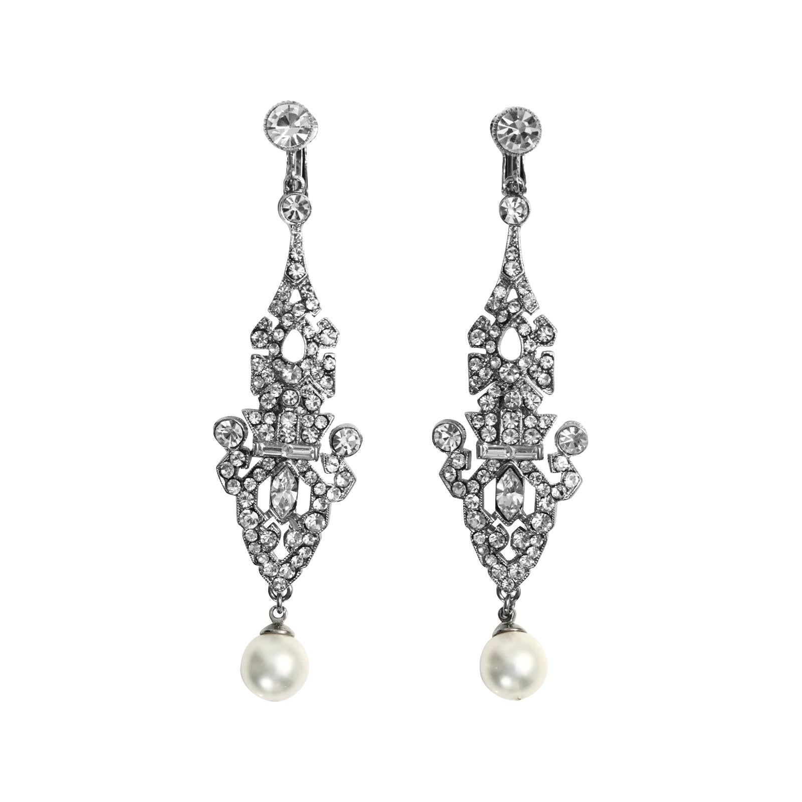 Vintage Art Deco Diamante with Faux Pearl Dangling Earrings Circa 1980s.  The earrings feature round, marquise, and baguette diamonds with a dangling pearl at the bottom, all in perfect condition.  These are so chic. Clip on.