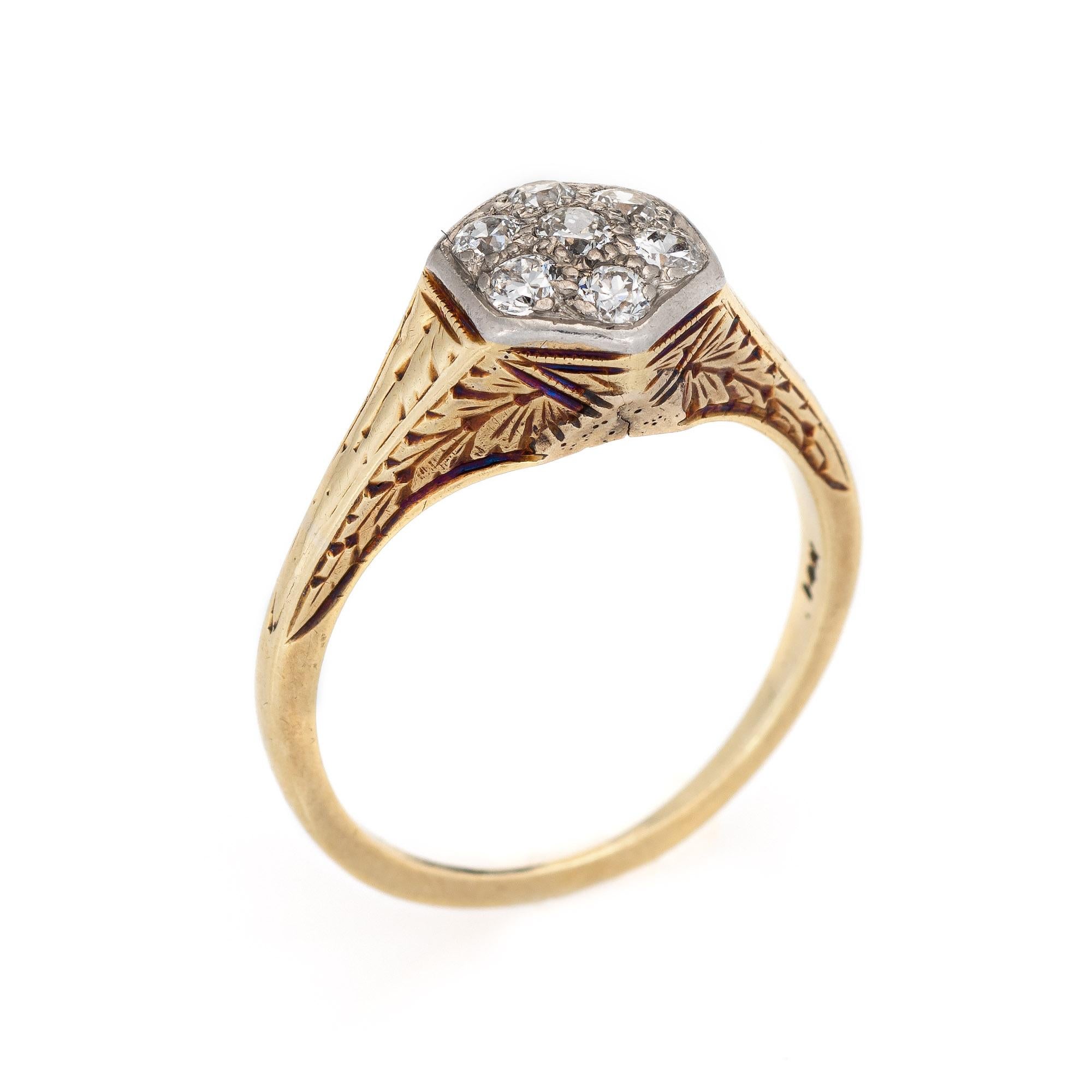 Elegant & finely detailed Art Deco era ring (circa 1920s to 1930s) crafted in 14k yellow gold & 900 platinum. 

7 estimated 0.05 carat old European cut diamonds total an estimated 0.35 carats (estimated at H-I color and VS2-SI1 clarity).     

The