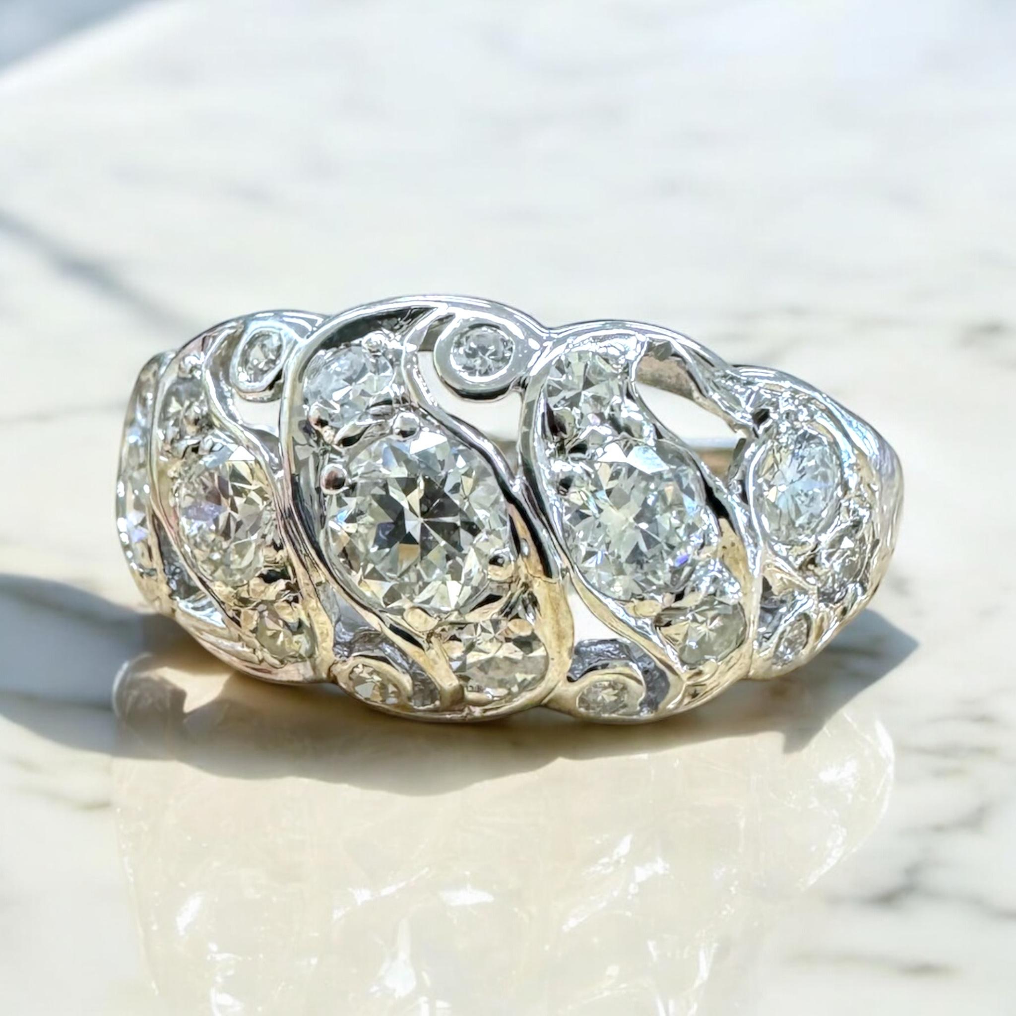 We are loving this vintage diamond beauty!

Ring Details
Material: 14K White Gold
Era: Art Deco 1920 - 1940
Head Width: 9.2mm
Head Height: 3.9mm
Shank Width: Tapering to 1.9mm
Weight: 3.1 Grams
Finger Size: 7
Sizable Upon Request

Accented by the