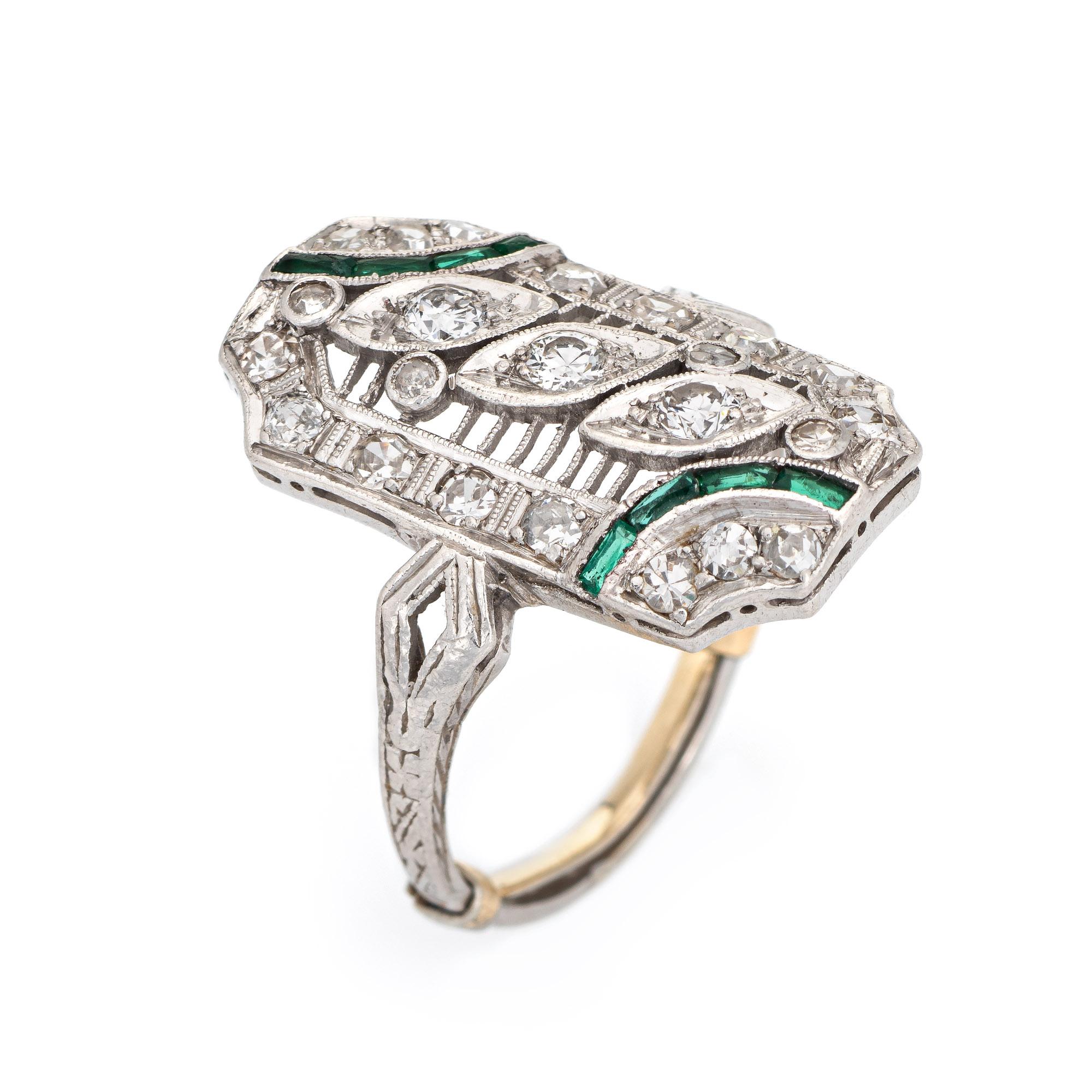 Finely detailed vintage Art Deco era diamond & emerald ring (circa 1920s to 1930s) crafted in 900 platinum. 

Old European and single cut diamonds total an estimated 1 carat (estimated at H0I color and VS2-SI2 clarity). The emeralds total an