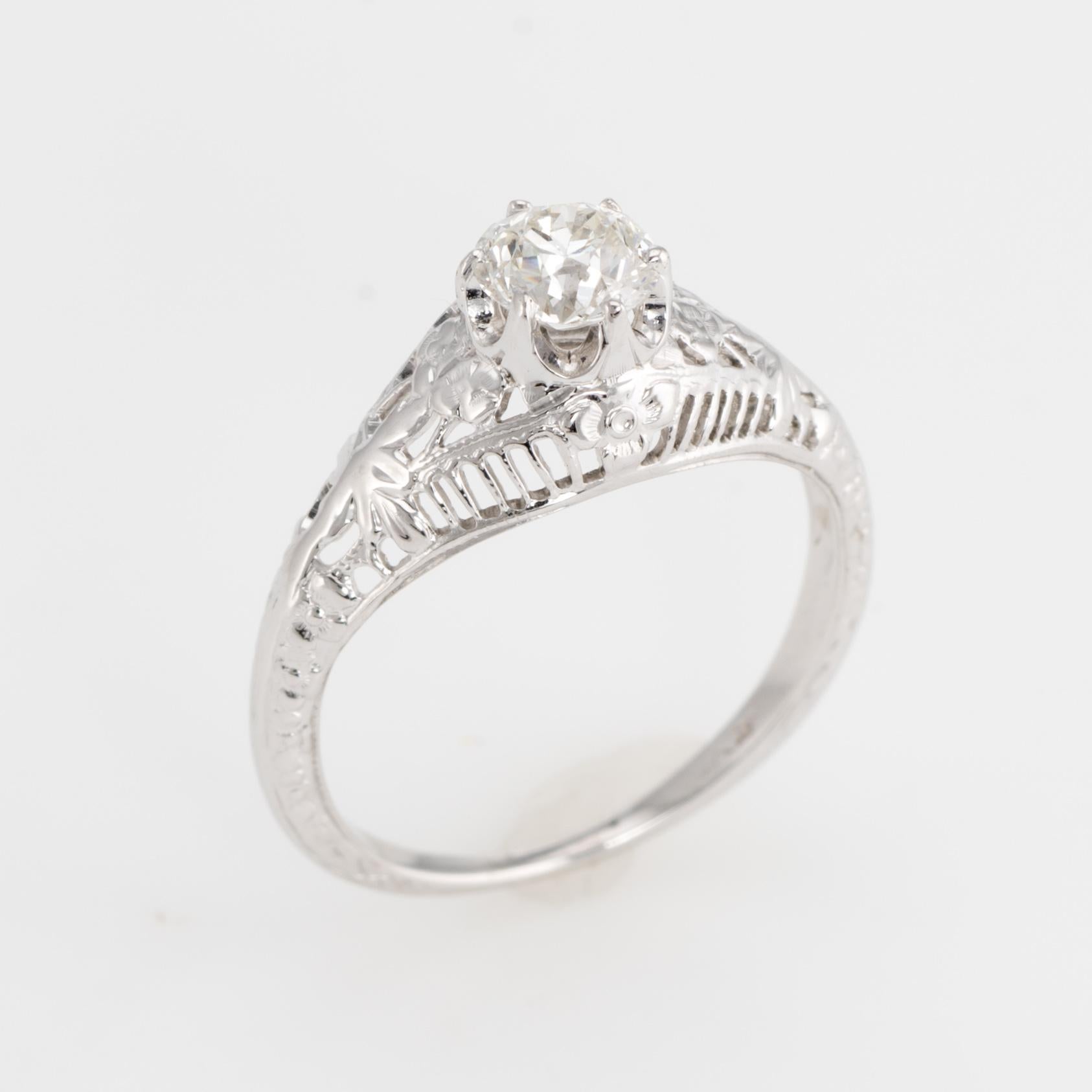 Elegant & finely detailed Art Deco era ring (circa 1920s to 1930s), crafted in 14 karat white gold. 

Centrally mounted estimated 0.50 carat Old Mine cut (estimated at H-I color and VS2 clarity).   

The ring epitomizes vintage charm and would make