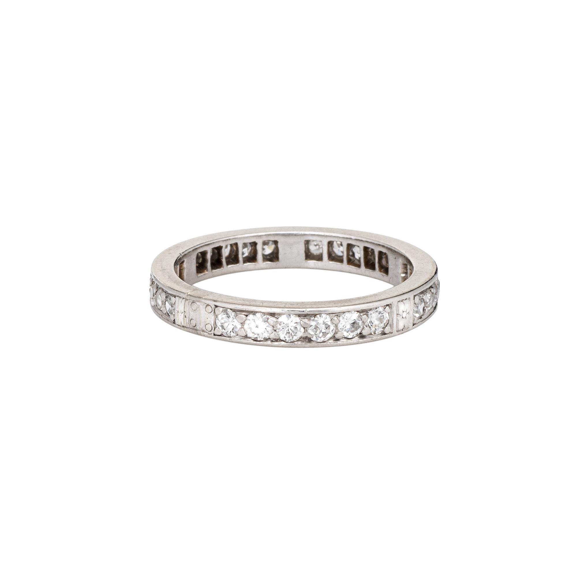 Finely detailed vintage Art Deco era diamond eternity ring (circa 1920s to 1930s), crafted in 900 platinum. 

Single & old European cut diamonds total an estimated 0.30 carats (estimated at H-I color and VS2-SI2 clarity). 

The band features five
