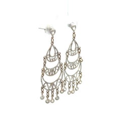 Pendientes colgantes de oro con diamantes Art Déco Vintage