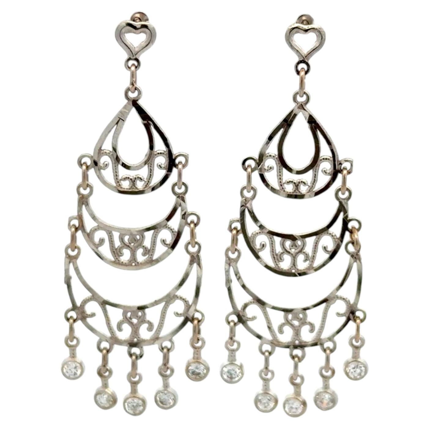 Orecchini a pendente con diamante e oro Art of Vintage