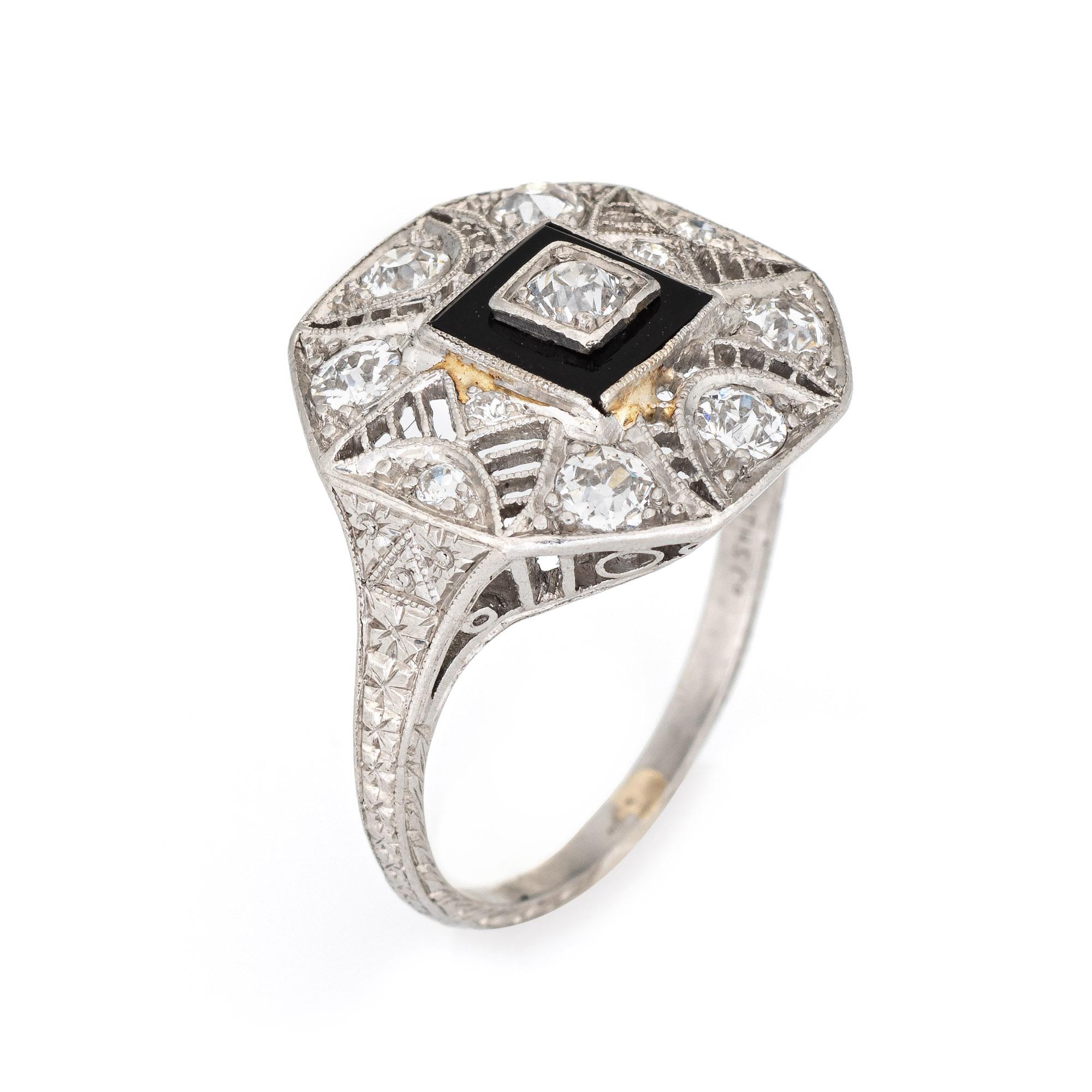 Elegant & finely detailed Art Deco era ring (circa 1920s to 1930s) crafted in 900 platinum. 

Old mine and single cut diamonds total an estimated 0.75 carats (estimated at H-I color and VS2-SI1 clarity).     

The ring epitomizes vintage charm and