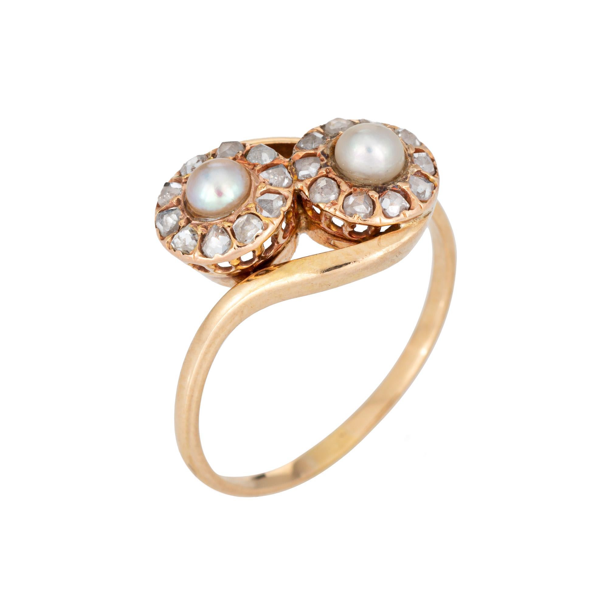 
Finely detailed vintage Art Deco era diamond & cultured pearl 'moi et toi' ring crafted in 14k yellow gold (circa 1920s to 1930s).  

20 old rose cut diamonds are estimated at 0.02 carats each and total an estimated 0.40 carats (estimated at J-K