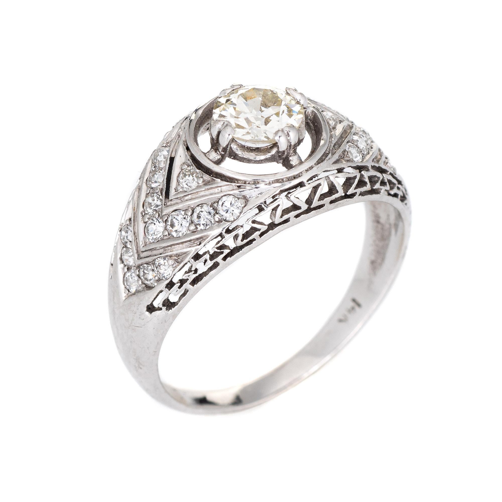 Finely detailed vintage Art Deco diamond ring (circa 1920s to 1930s) crafted in 14k white gold & platinum. 

Center set old European cut diamond is estimated at 0.55 carats, accented with an estimated 0.26 carats of diamonds. The total diamond