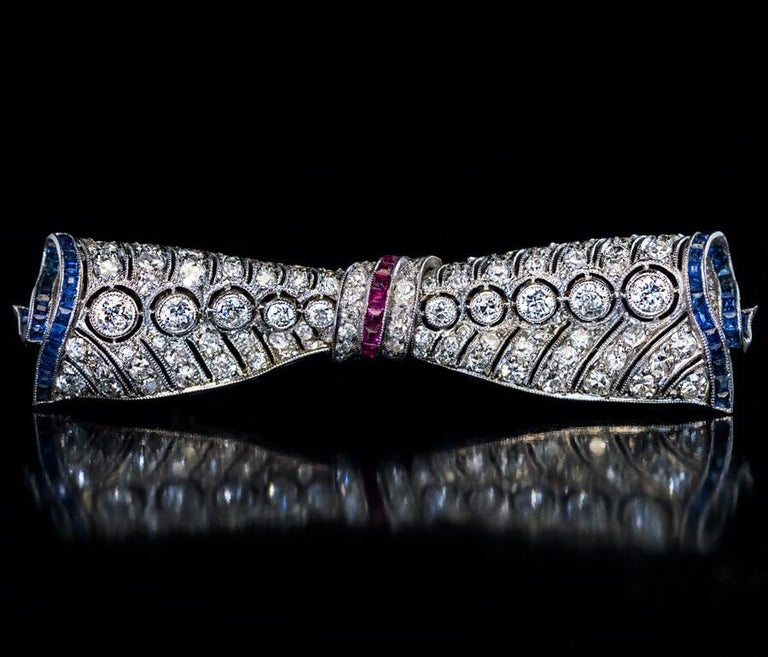 Vintage Art Deco Diamond Ruby Sapphire Bow Brooch In Excellent Condition For Sale In Chicago, IL