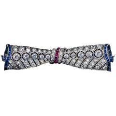 Vintage Art Deco Diamond Ruby Sapphire Bow Brooch