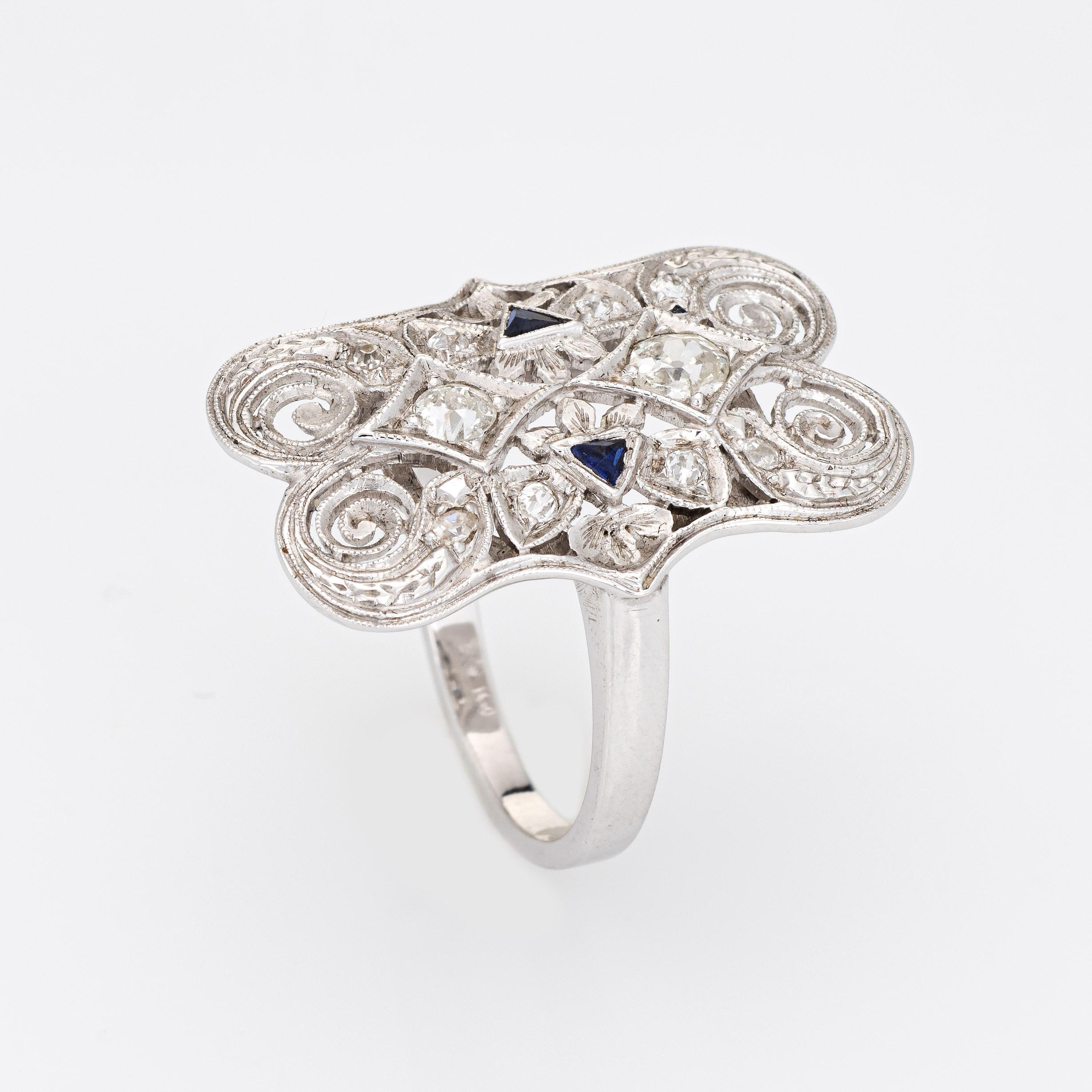 Finely detailed vintage Art Deco era diamond & sapphire ring (circa 1920s to 1930s) crafted in 14k white gold. 

Two old mine cut diamonds are estimated at 0.10 carats each, accented with a further 8 estimated 0.02 carat diamonds. The total diamond