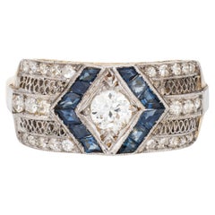 Anello vintage Art Deco con diamante e zaffiro in oro 18k e platino Estate Jewelry