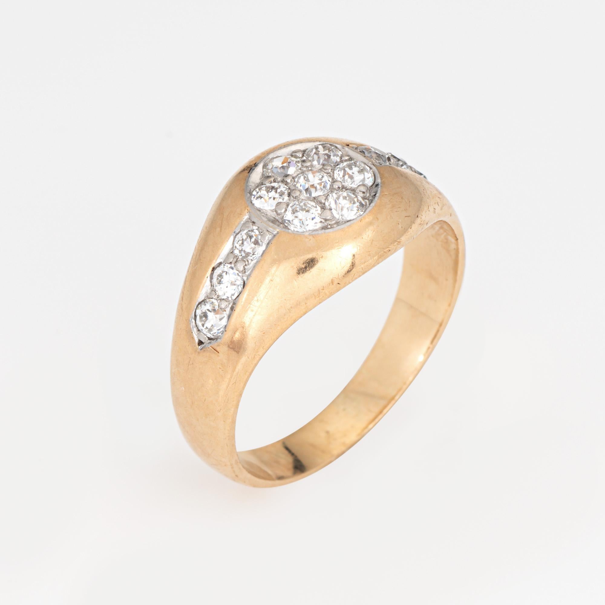 Vintage Art Deco diamond signet ring (circa 1920s to 1930s) crafted in 14 karat yellow gold. 

13 old European cut diamonds total an estimated 0.52 carats (estimated at I-J color and VS2-SI2 clarity).

The circular mount and side shoulders feature a
