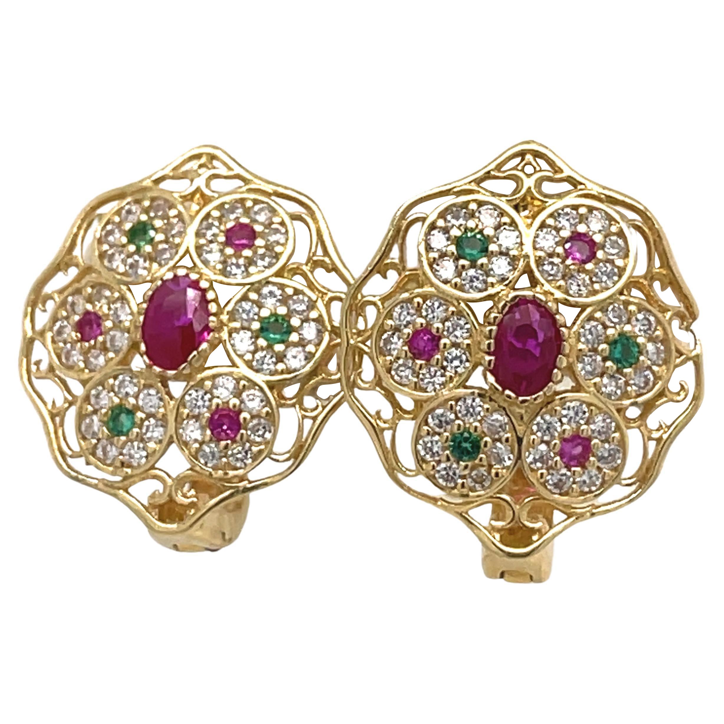 Vintage Art Deco Earrings- 18k Yellow Gold Oval+Round Multi-Color Cubic Zirconia

~~ S e t t i n g ~~
Solid 18k Yellow Gold
4.31 grams
 Size : 17.20 x 14.55

~~ Stones ~~
Main Stone:
Oval Shape Cubic Zirconia In Weight Of 0.30 Ct (Approx.)
Color  -