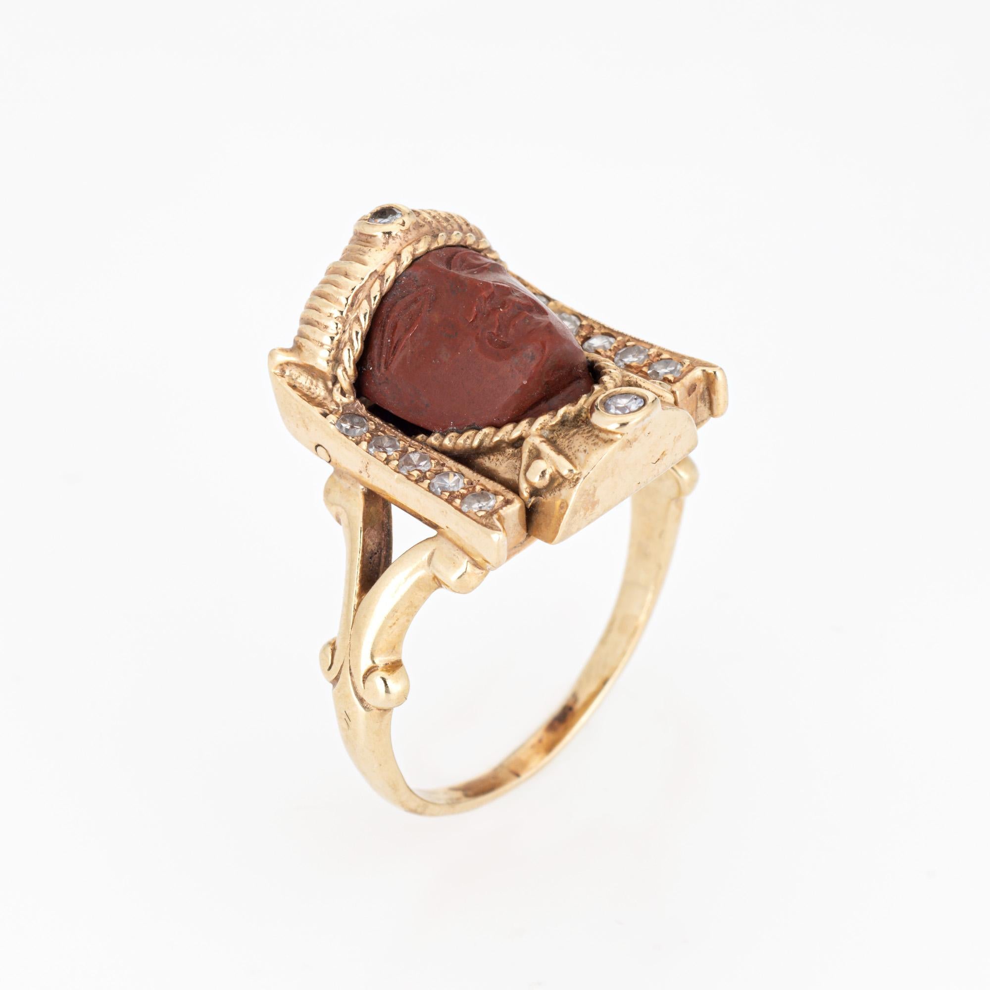 Finely detailed vintage Art Deco Egyptian Revival Pharaoh ring (circa 1920s) crafted in 14k white gold. 

Jasper measures 9mm x 8mm. 12 small single cut diamonds total an estimated 0.06 carats (estimated at H-I color and SI2-I2 clarity). The jasper