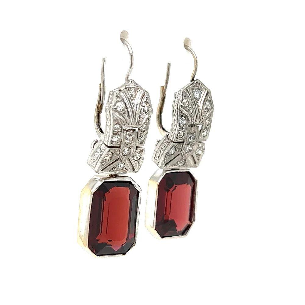 Simply Beautiful! Finely detailed Vintage Art Deco Emerald-cut Garnet and Diamond Gold Drop Earrings. Each earring Hand set with an Emerald-cut Garnet, weighing approx. 12tcw for both and Diamonds, approx. 0.45tcw. Each earring measuring approx.