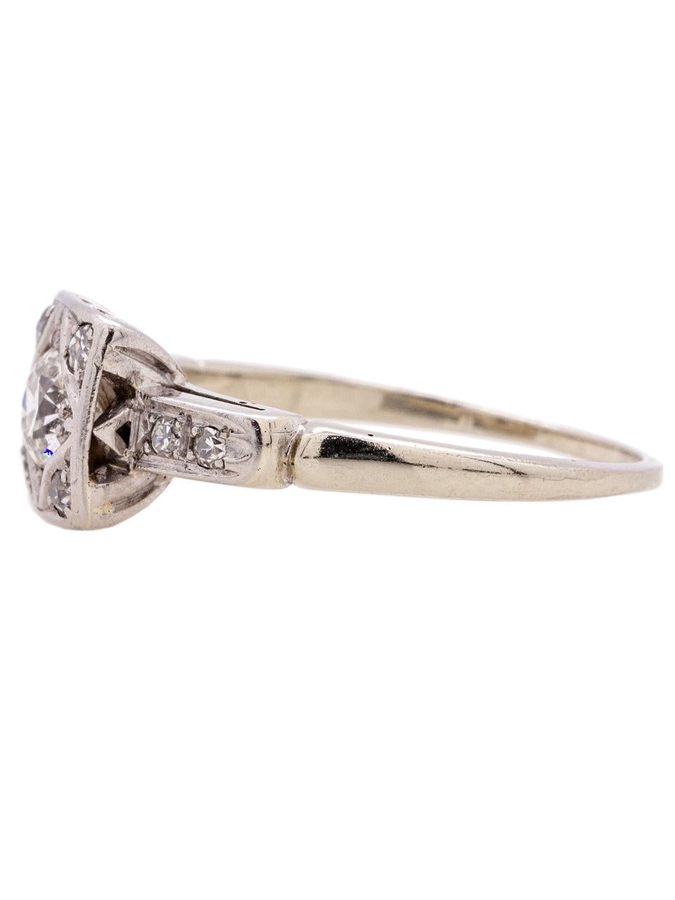 Lovely vintage Art Deco 14k white gold diamond engagement ring with square illusion setting featuring a stunning 0.40ct Old European Cut center diamond (J-SI2), surrounded by eight small round single cut side diamonds, adding an additional .20ct,