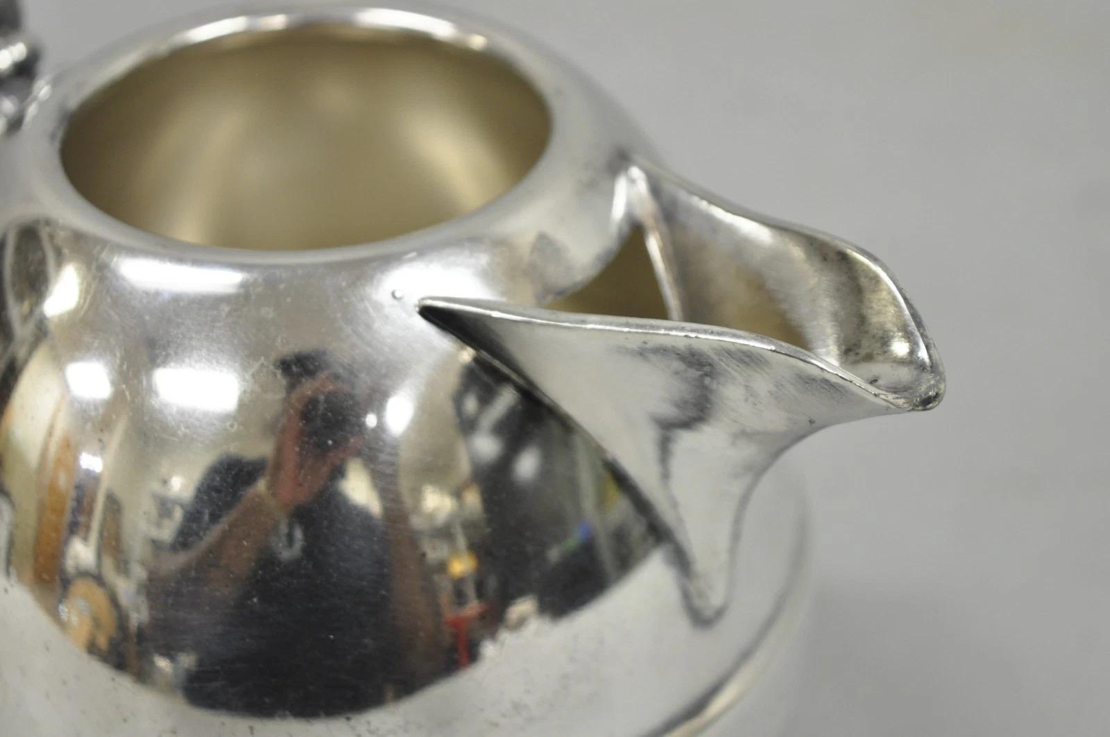 Vintage Art Deco E.P. Copper Silver Plated Bulbous Water Pitcher Jug w/ Handle In Good Condition For Sale In Philadelphia, PA