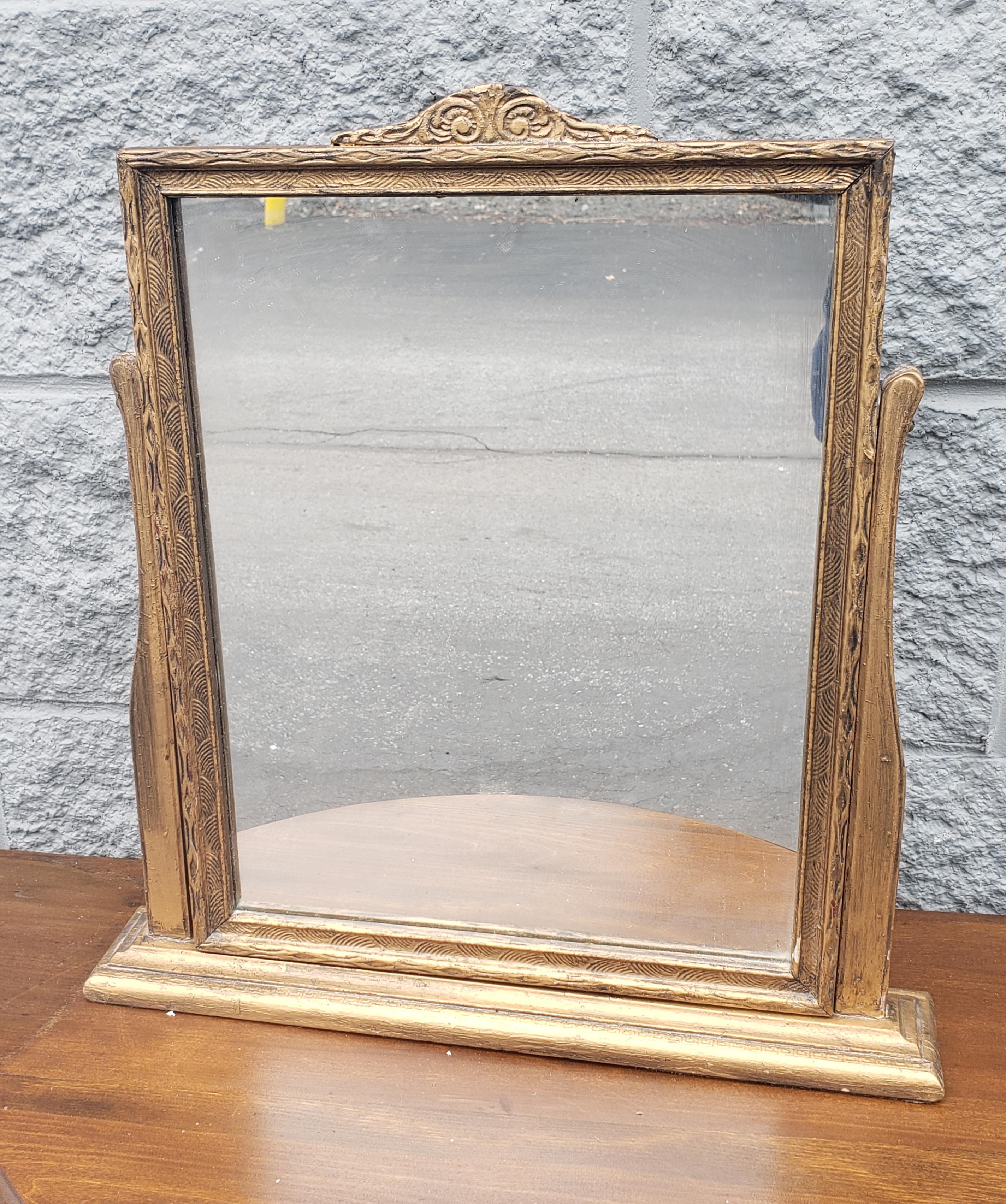Exquisite art deco giltwood self standing table mirror.
Very Good Vintage condition with appropriate with use and history


W5.